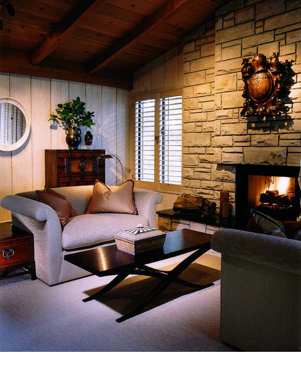  The classic Pebble Beach style fireplace wall was paramount in selecting the furnishings. 