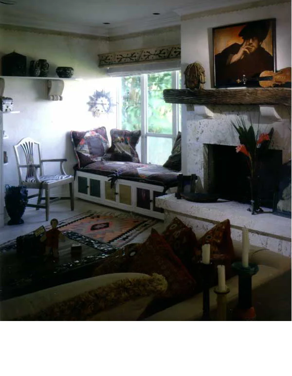 Faded jewel tones were used in the accents of tile and upholstery, to compliment mosaic work in the adjacent kitchen. 