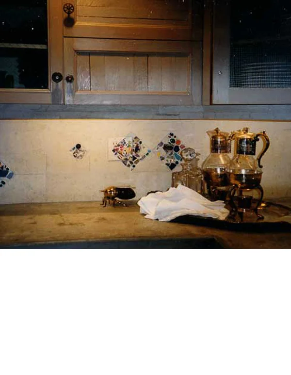 Various doors made of lath and screening were used in the cabinets throughout the kitchen.