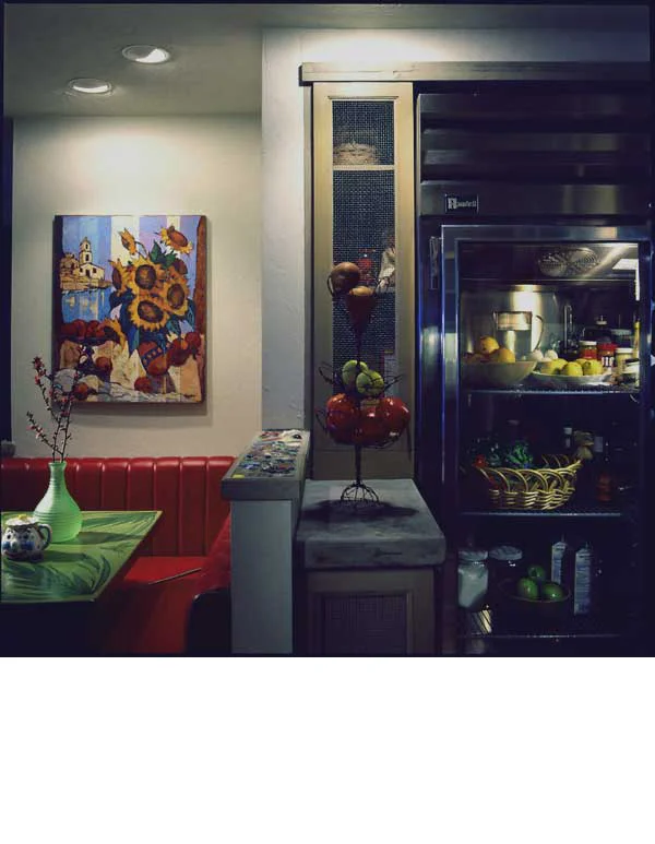 Industrial equipment was chosen to contrast the earthiness of the country style cabinets and counters.