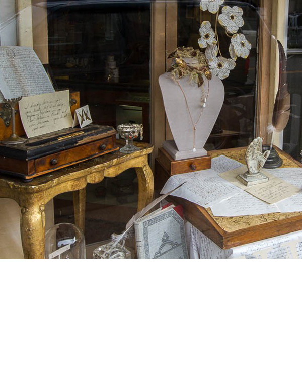 Antique furnishings are easy to work with the backdrop of old windows.