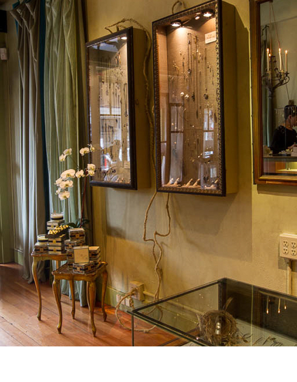 Since direct lighting through the walls wasn't possible, cloth wrapped cords with stiff wire was used to access outlets, creating a wild vine effect.