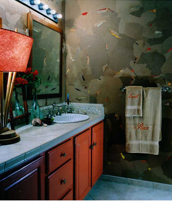  Walls were made with torn paper bags and magazine scraps. Backsplash was a tumbled marble replaced in areas with shells. 