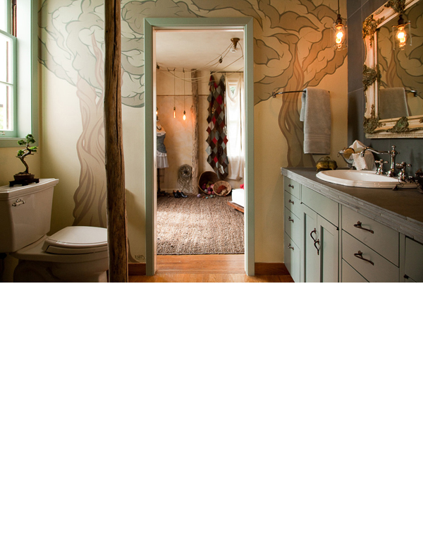 Ricky Watts, a graffiti artist, painted a tree mural in keeping with the green story of this interior. 