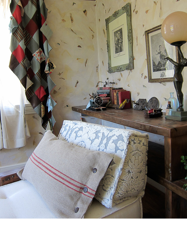 Old redwood pier boards from a local dock were given to Tripp Carpenter, a local furniture builder, who built the chaise and shelving in the room.