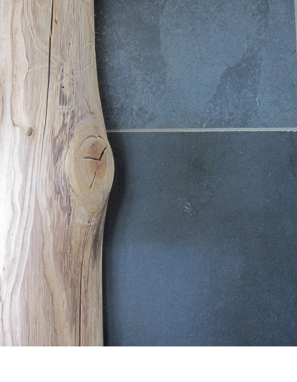  Slate was scribed carefully to fit the organic edge of the tree trunks. 