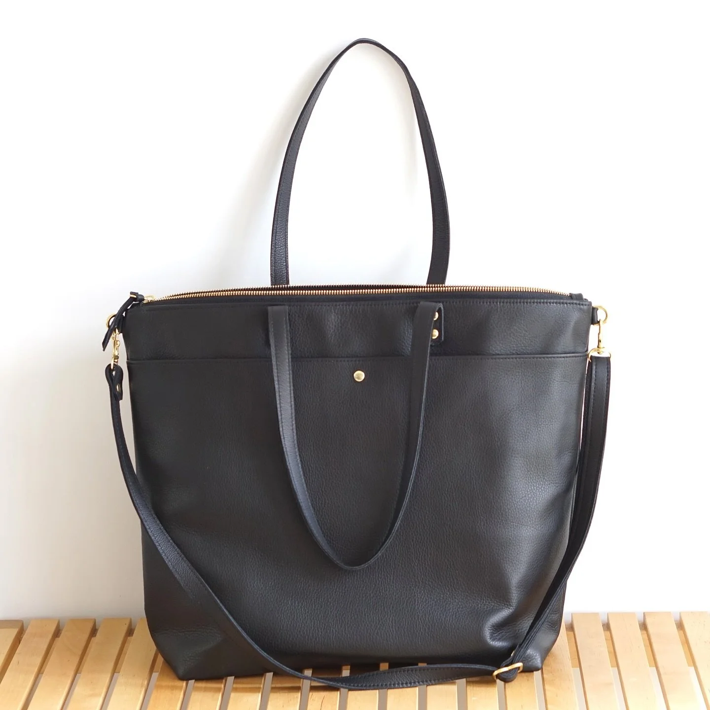 An all leather Travel Tote. Perfect for travel, work, diaper/kid stuff, or snacks.
What would you carry in this extra roomy tote?