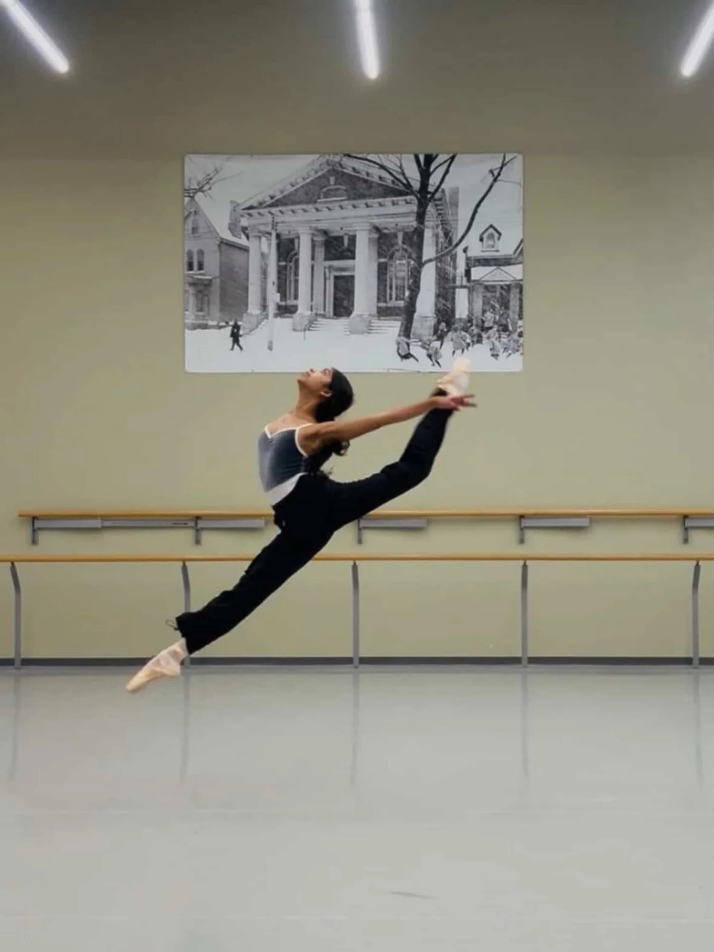🩶

#browngirlsdoballet #brownballerina #dancephotography 

🩰: @ishnaballet 

Image Description: Dancer jumps in a split position. She is wearing a gray and white leotard with black pants and pointe shoes. She is in a dance studio.