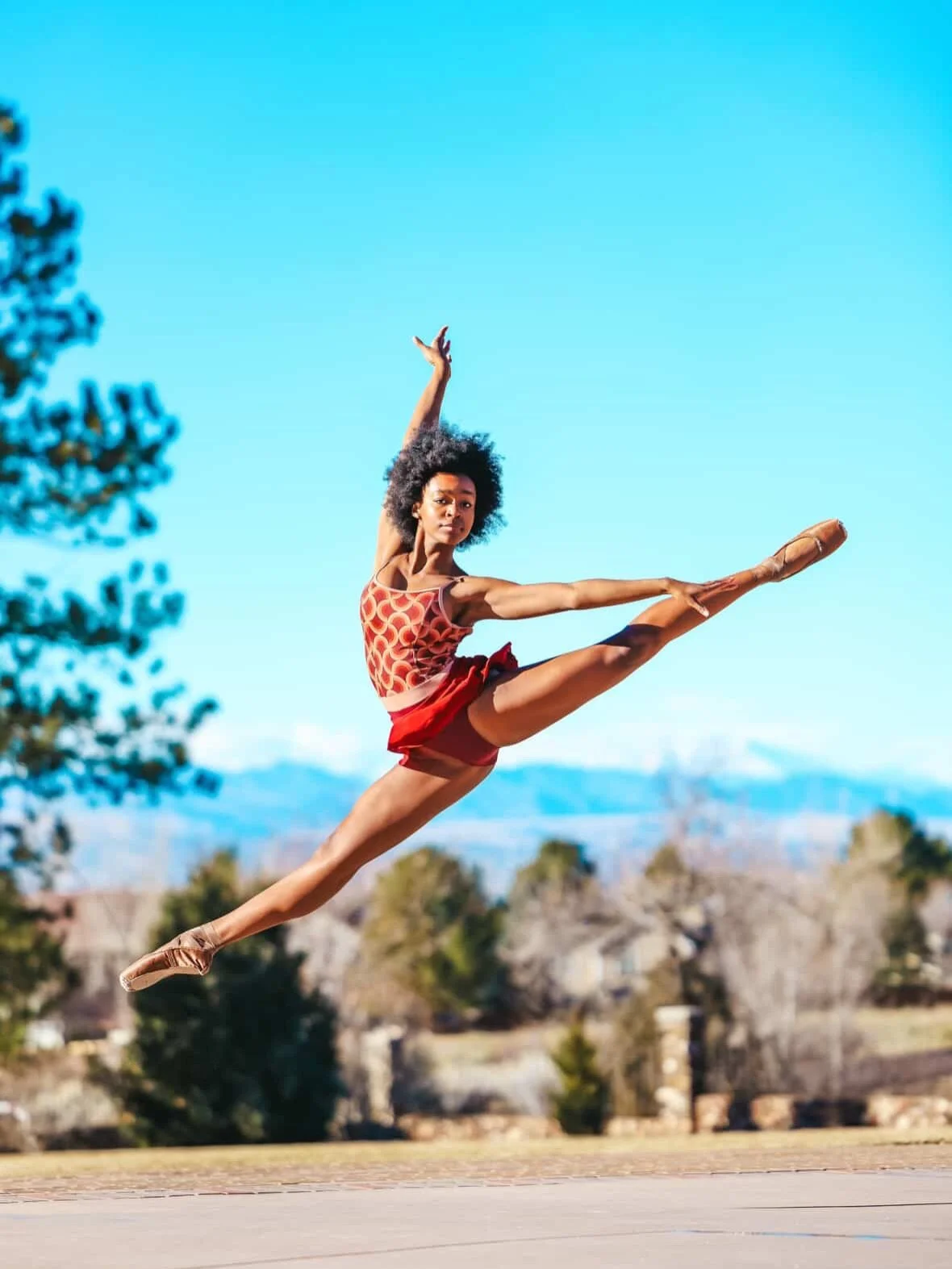 &hearts;️

#browngirlsdoballet #brownballerina #dancephotography 

🩰: @callie_black.dancer 
📸: @kayleekintzphotography 

Image Description 1: Dancer jumps in a split position with one arm up and the other reaching behind her. She is wearing a red l