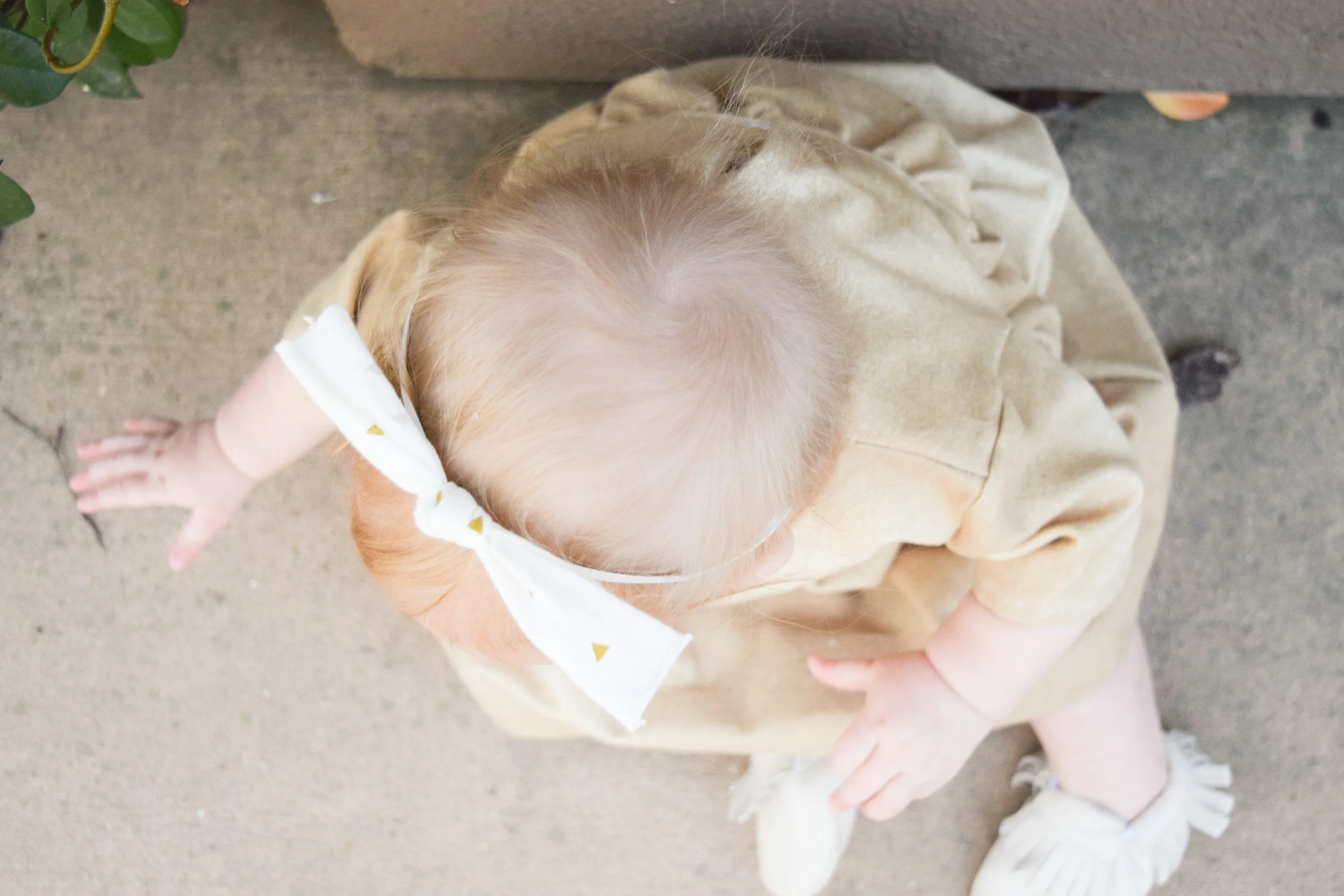 BABY FASHION | A gold baby holiday dress and red baby flower headband