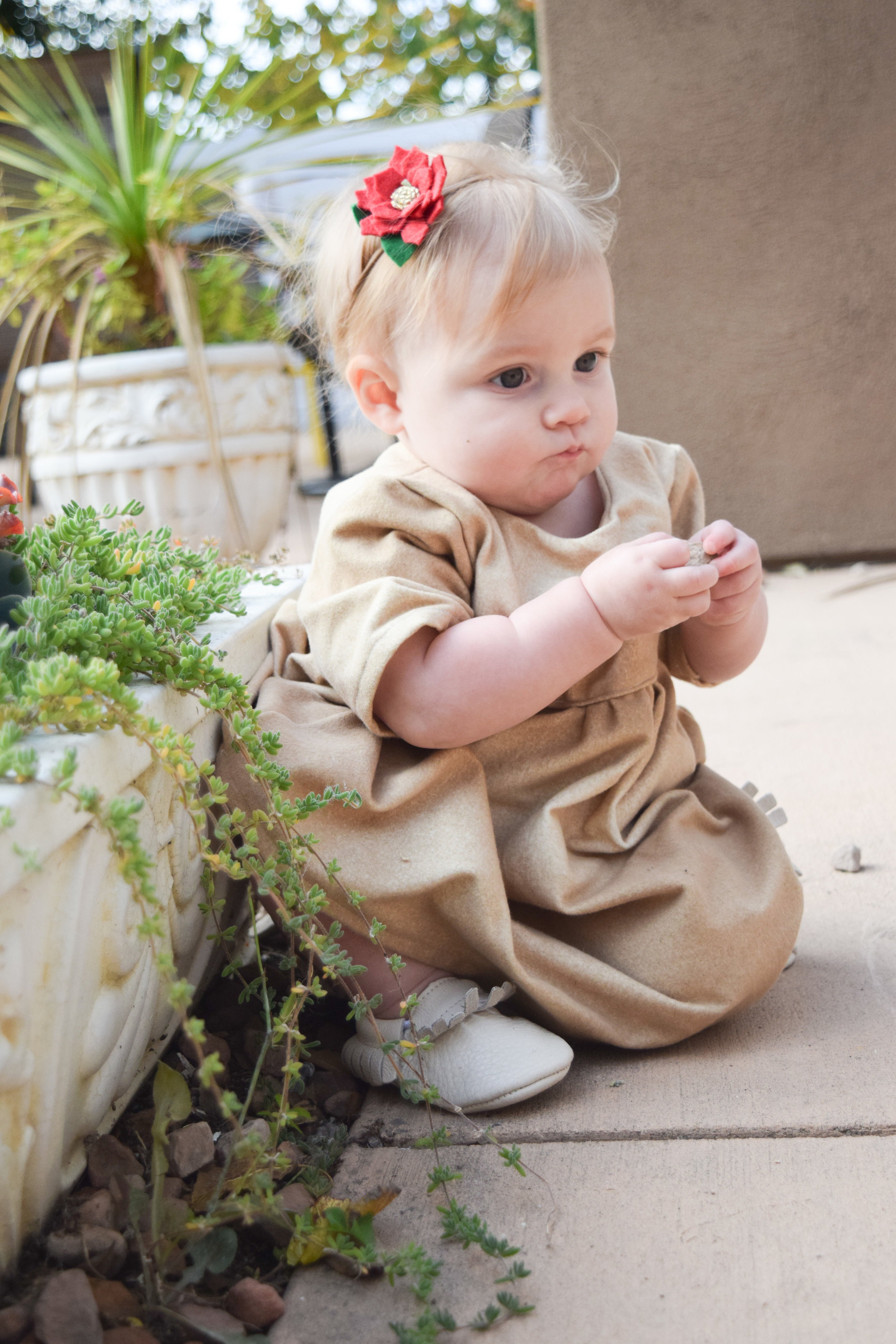 BABY FASHION | A gold baby holiday dress and red baby flower headband