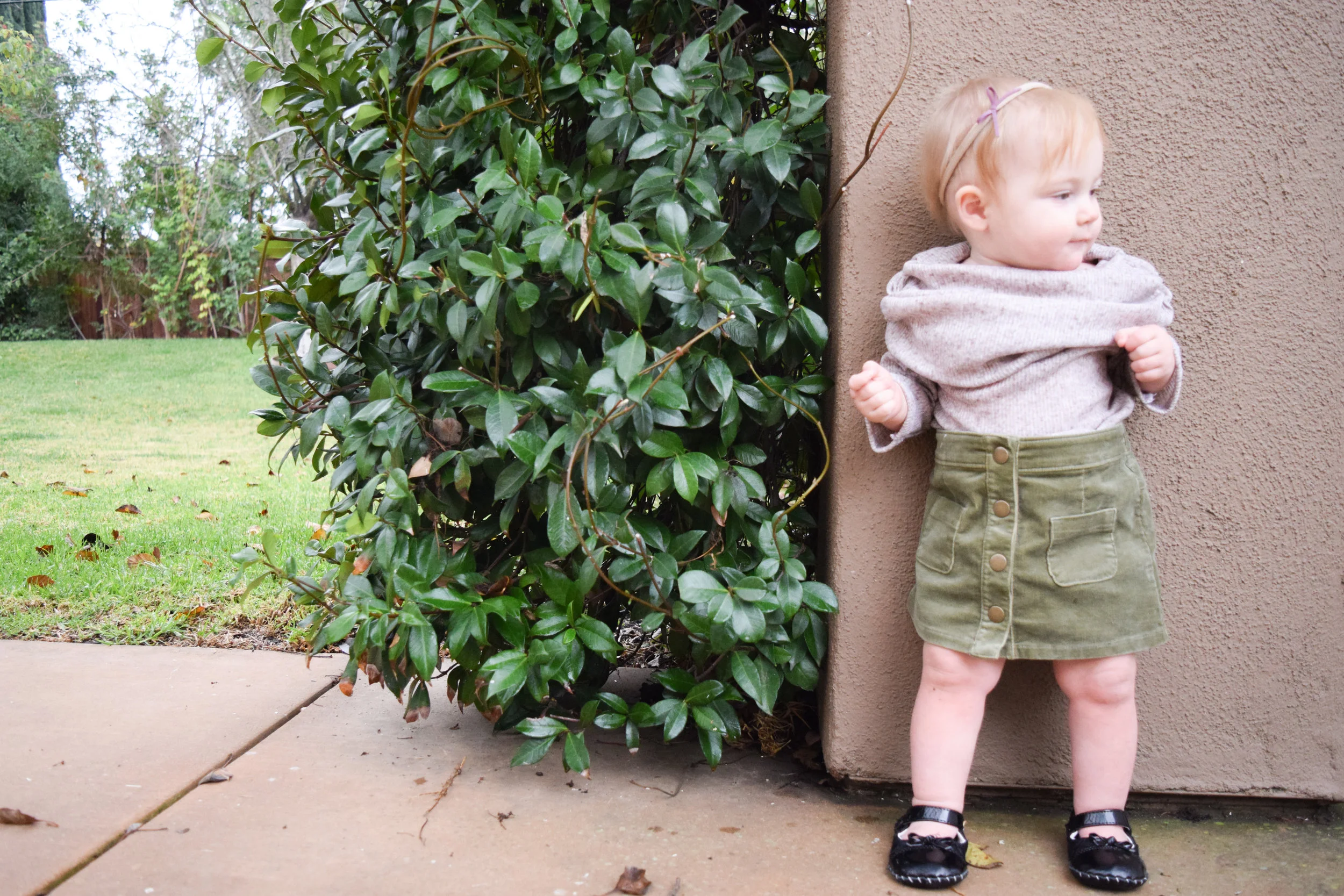 http://www.theoverwhelmedmommy.com/blog/baby-fashion-tan-off-the-shoulder-baby-tunic-olive-green-corduroy-baby-skirt