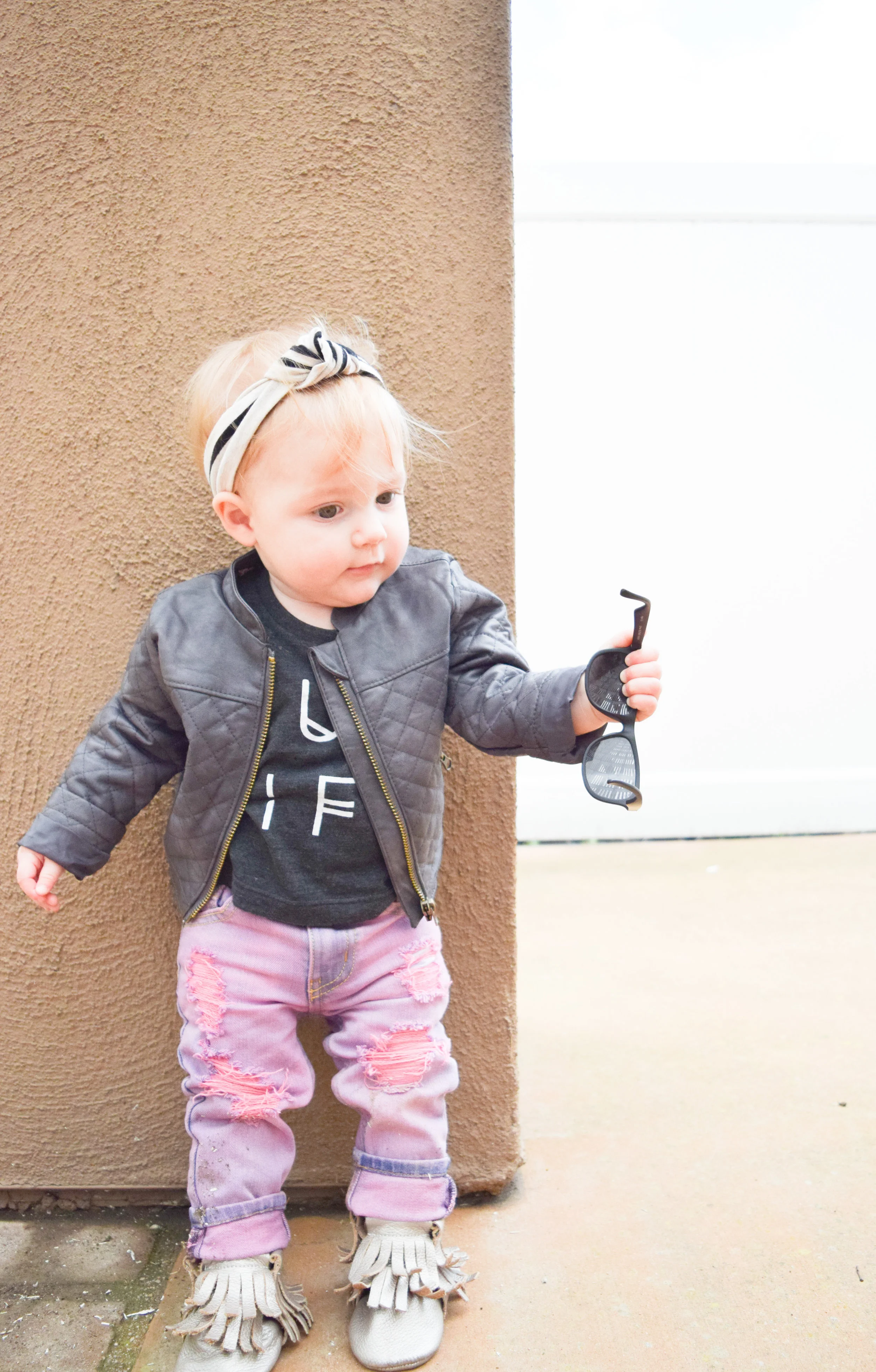 BABY FASHION - pink baby distressed jeans, baby leather jacket, hug life baby t shirt, baby sunglasses, champagne baby fringe boots