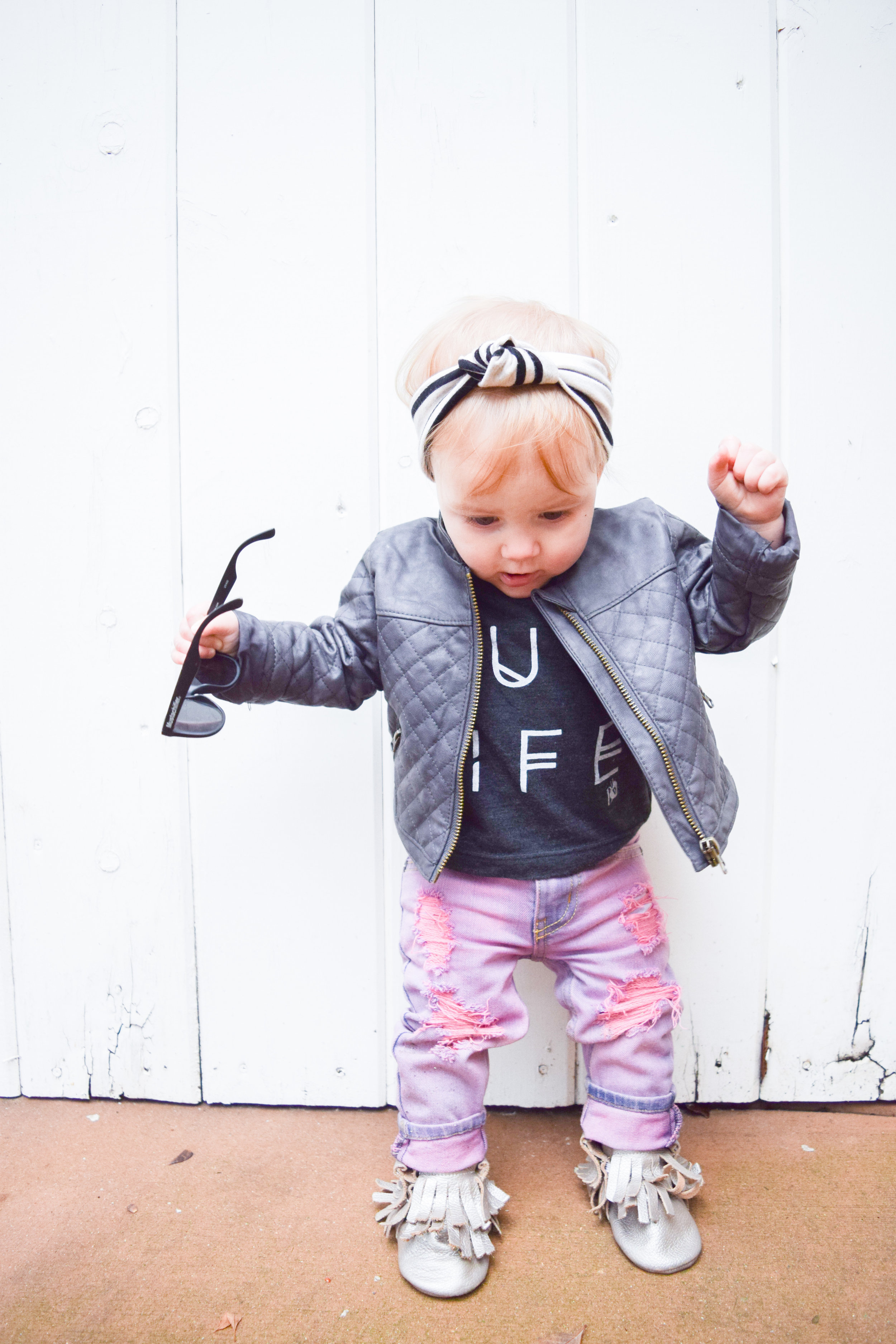 BABY FASHION - pink baby distressed jeans, baby leather jacket, hug life baby t shirt, baby sunglasses, champagne baby fringe boots
