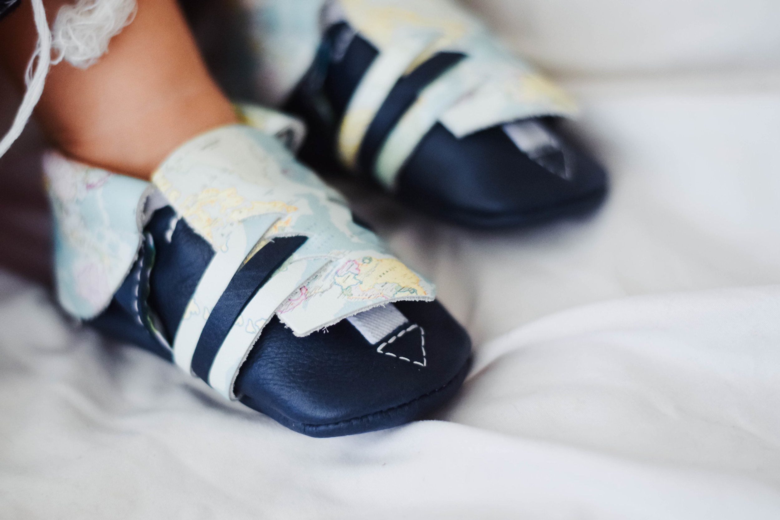 Kinbe - Moccasins That Grow With Your Baby's Feet - Socially Conscious Kids Fashion - Kinbe Village Drive
