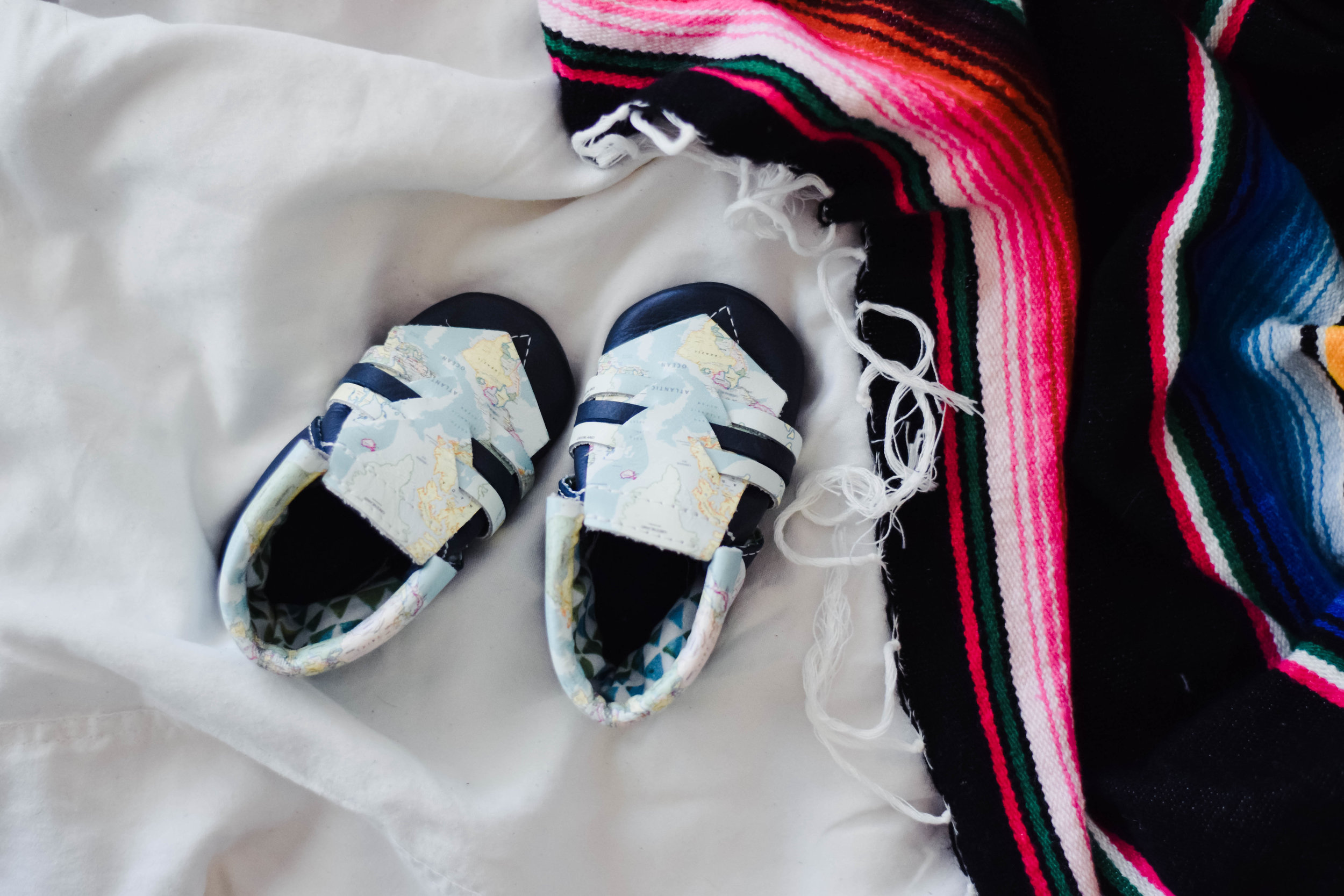 Kinbe - Moccasins That Grow With Your Baby's Feet - Socially Conscious Kids Fashion - Kinbe Village Drive