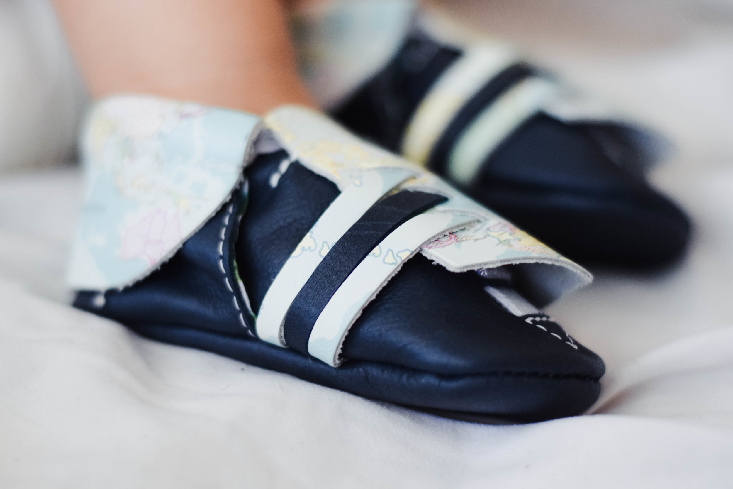 Kinbe - Moccasins That Grow With Your Baby's Feet - Socially Conscious Kids Fashion - Kinbe Village Drive