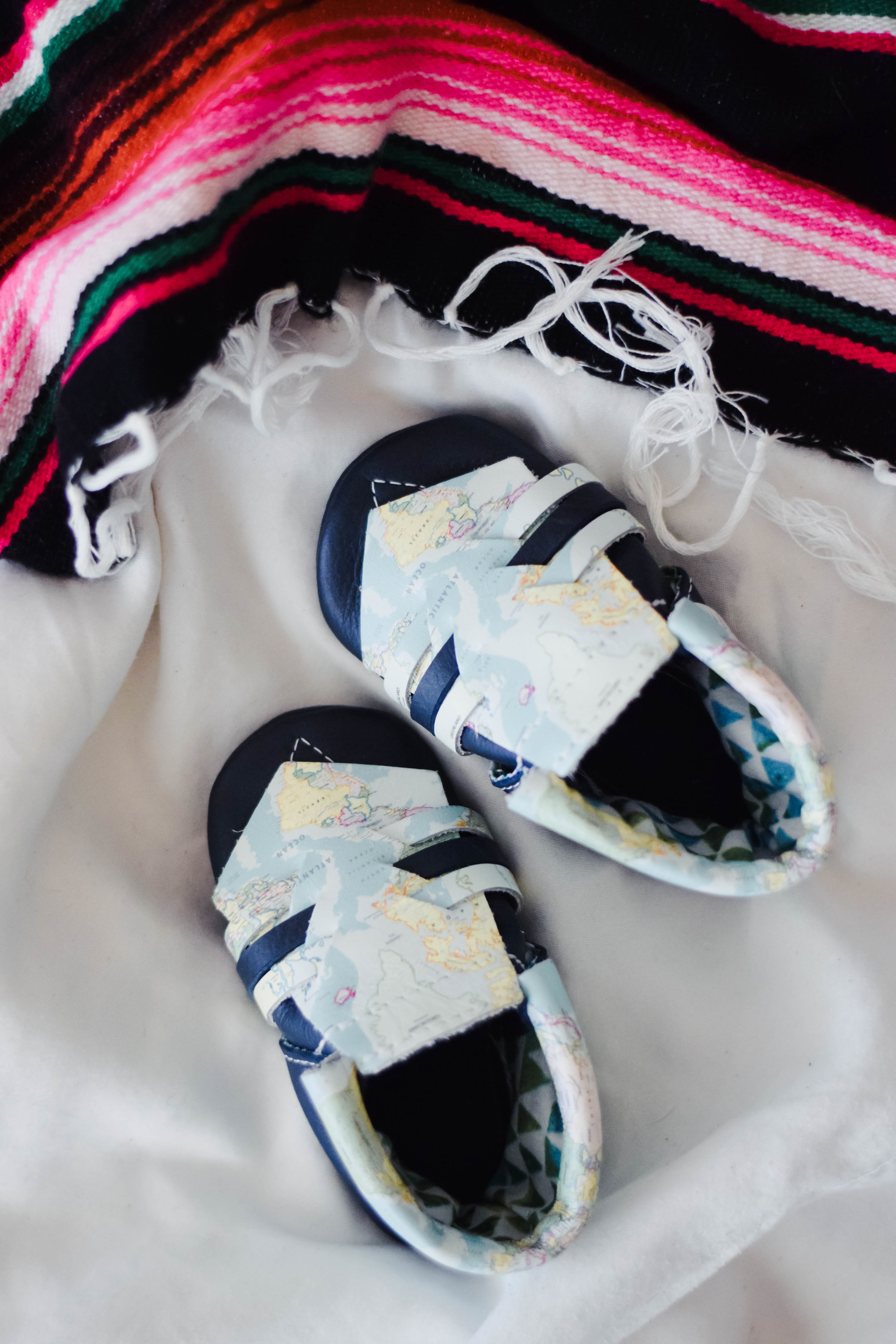 Kinbe - Moccasins That Grow With Your Baby's Feet - Socially Conscious Kids Fashion - Kinbe Village Drive