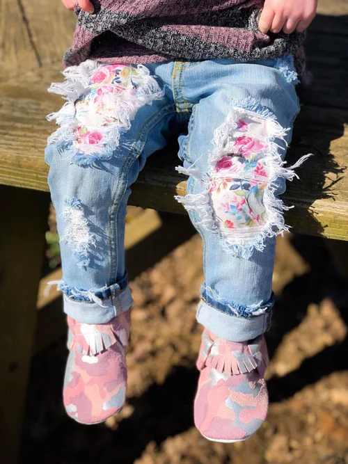 Ripped jeans with material underneath discount