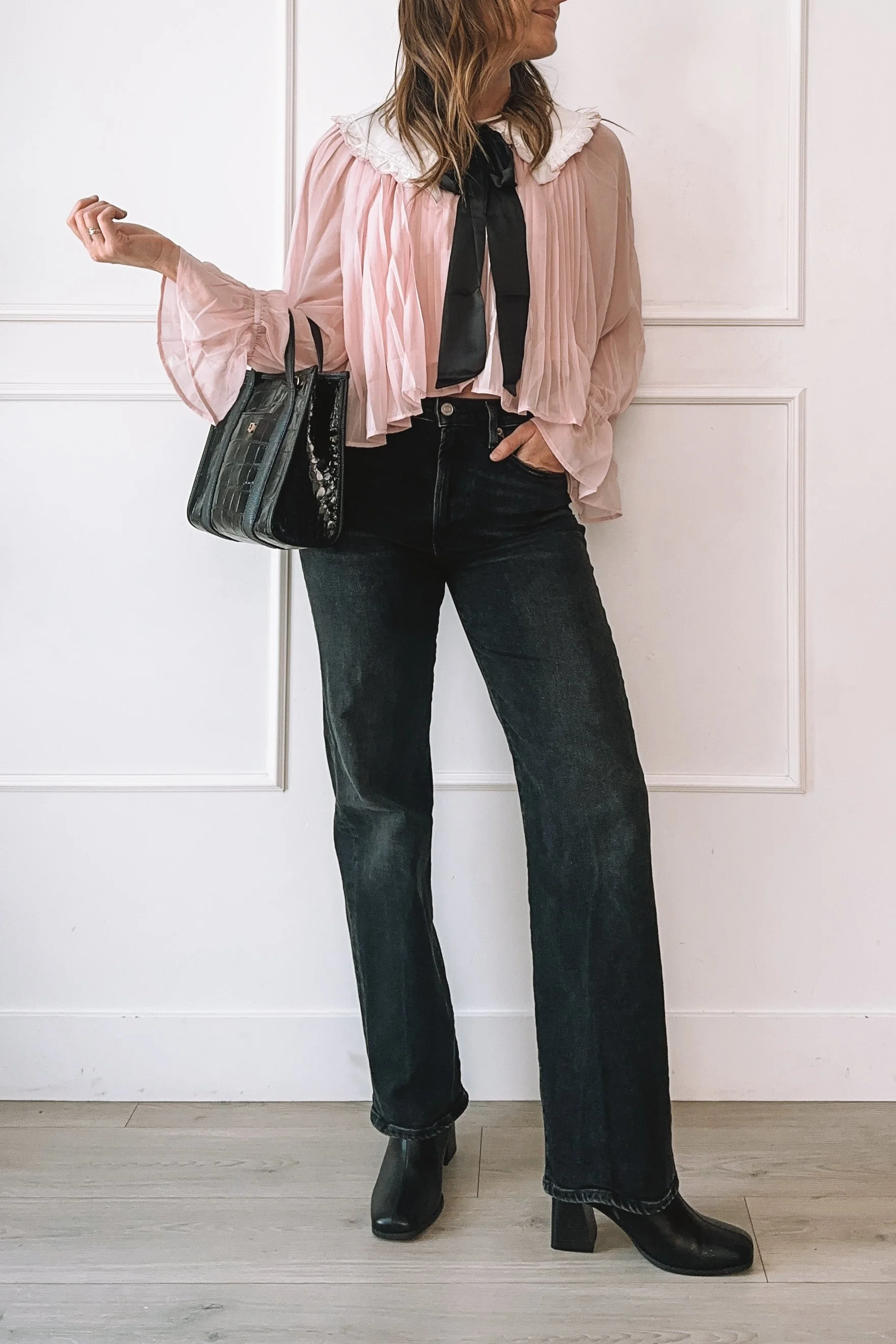 Romantic Meets Edge: How to Style a Soft Blouse with Black Denim