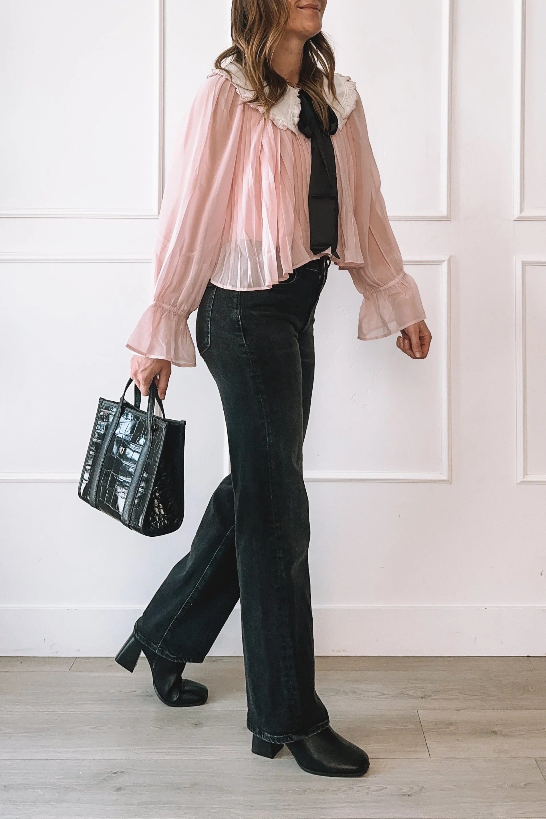 Romantic Edgy Outfit with Pink Blouse and Black Jeans