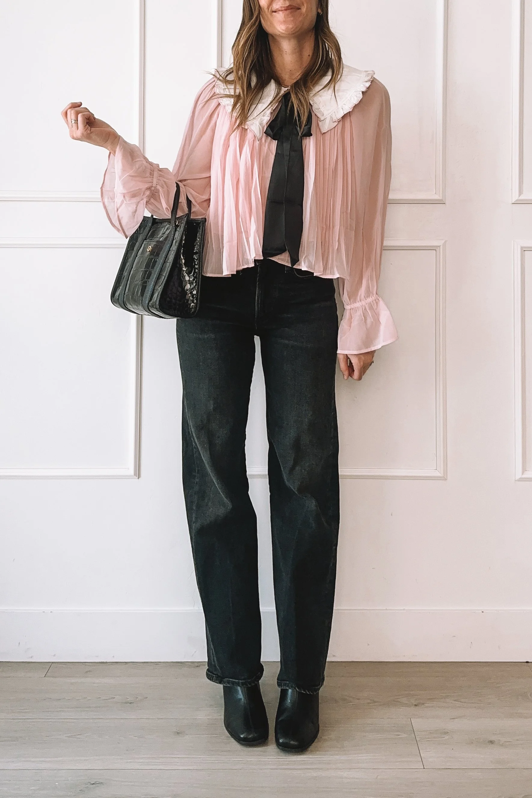 Romantic Edgy Outfit with Pink Blouse and Black Jeans