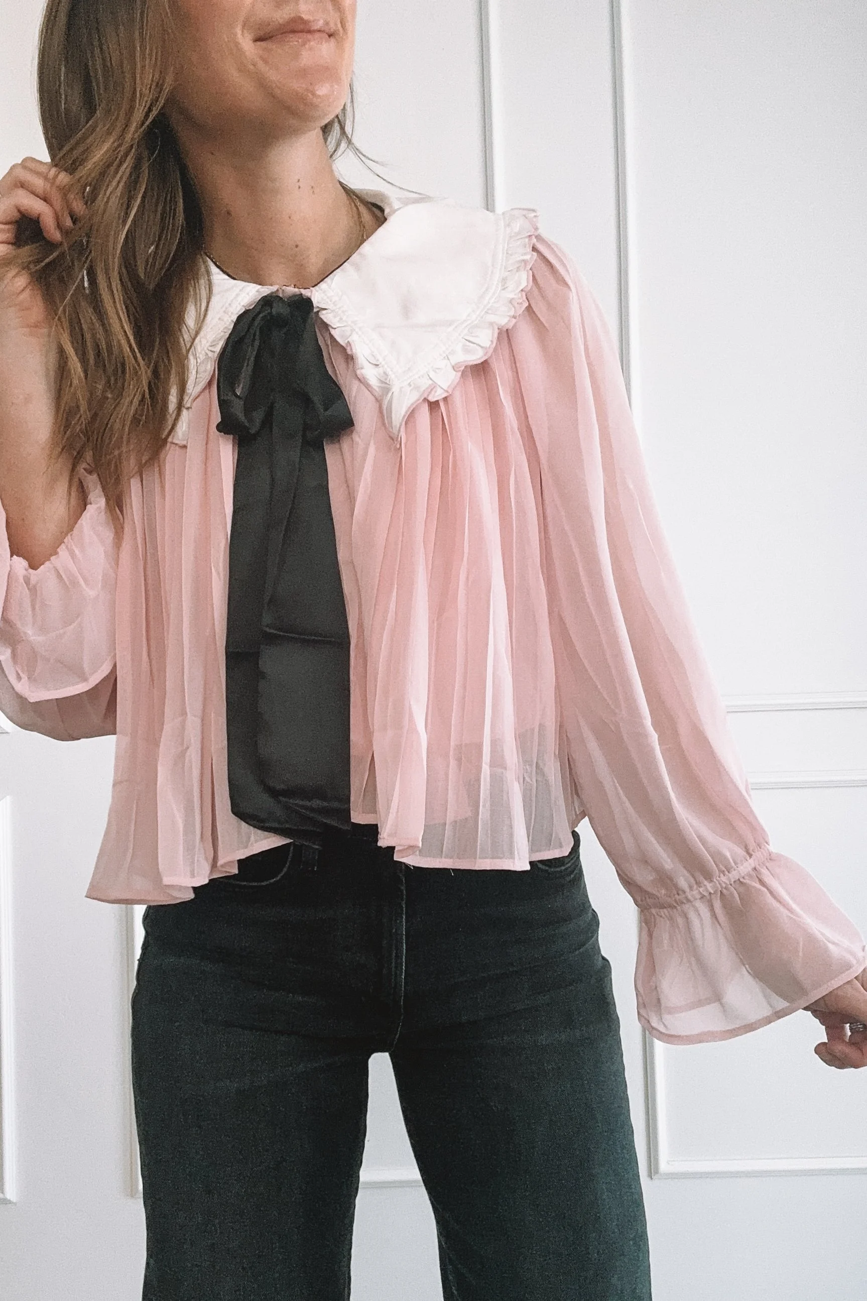Flowy Pink Blouse Styled with Black Denim