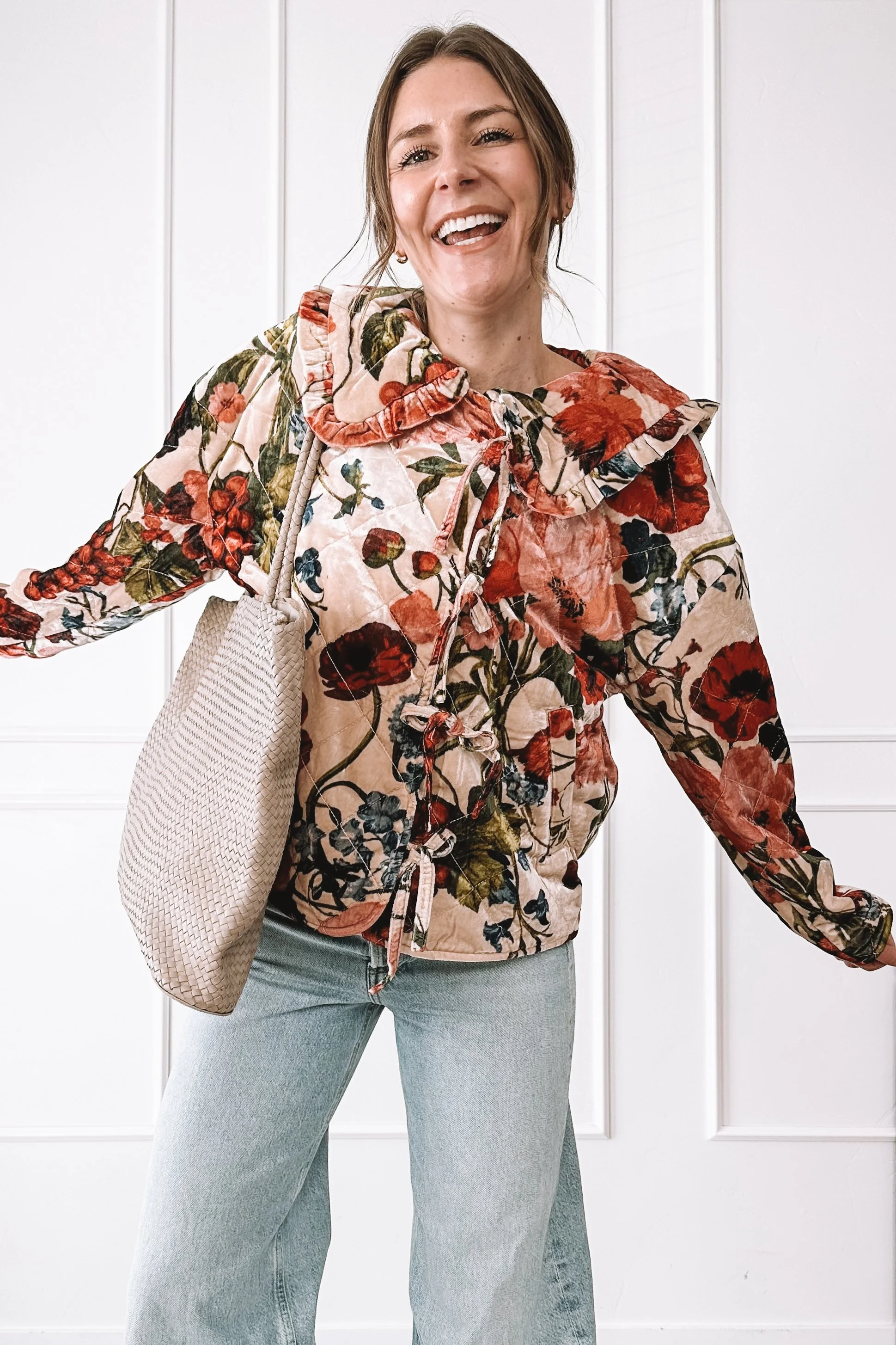 Easy everyday mom outfit with floral blouse and wide leg jeans