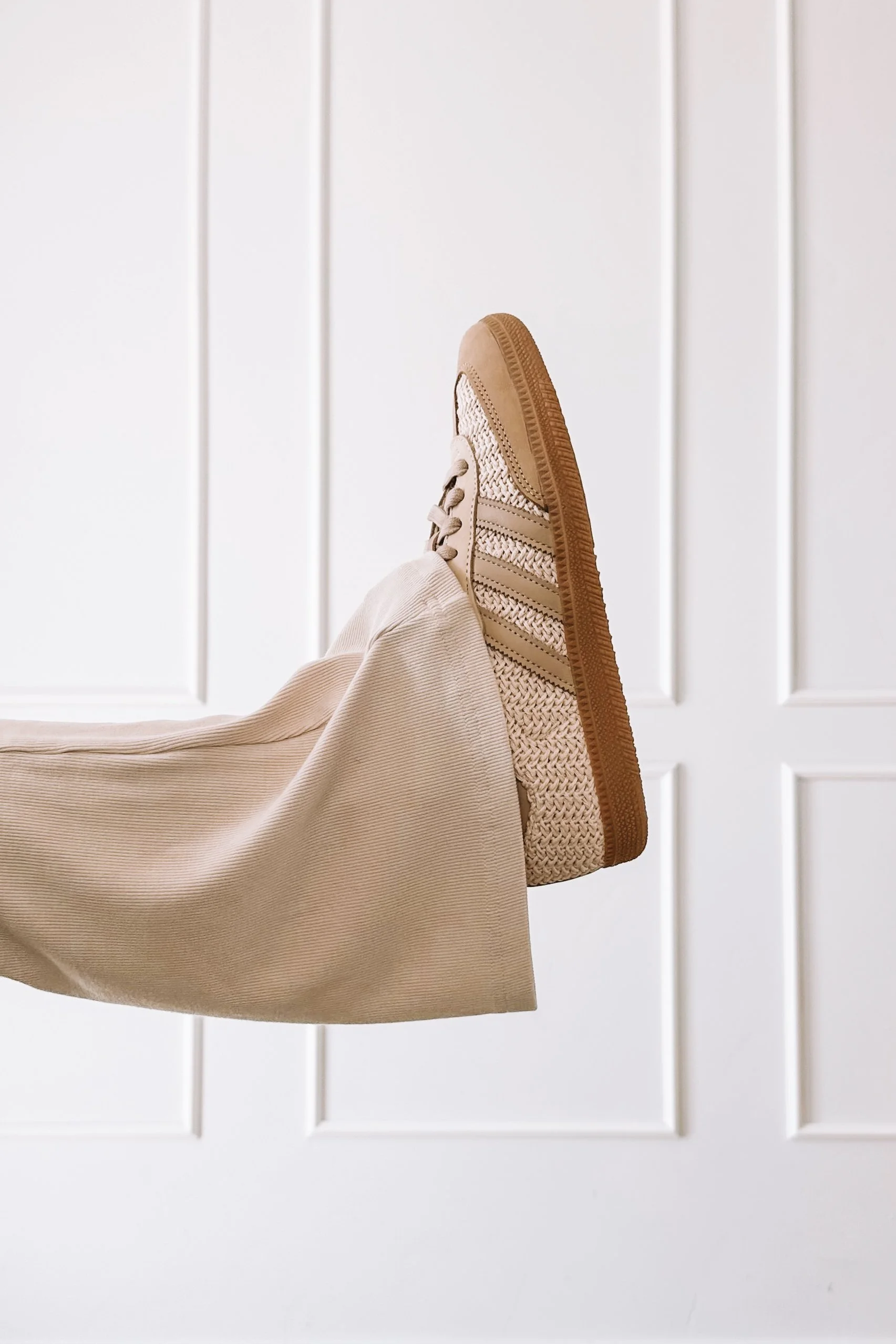 Comfy but put together ivory set with bomber jacket and Sambas