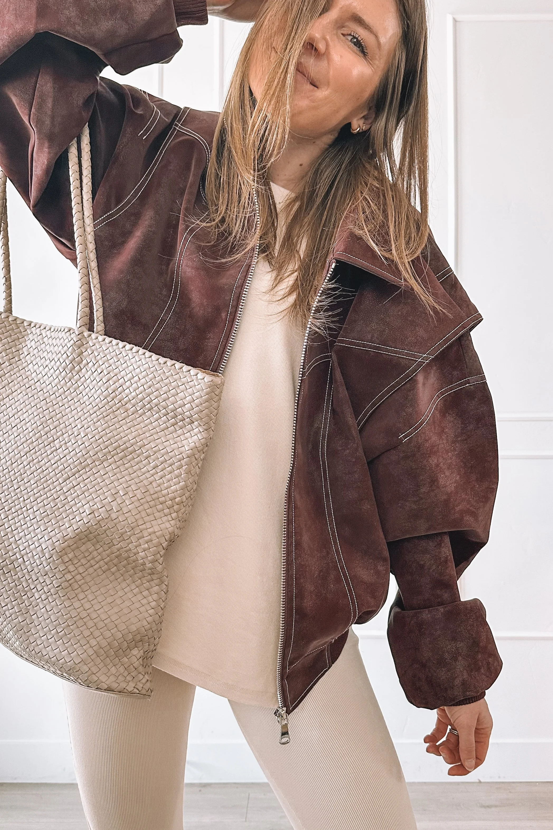 Comfy but put together ivory set with bomber jacket and Sambas