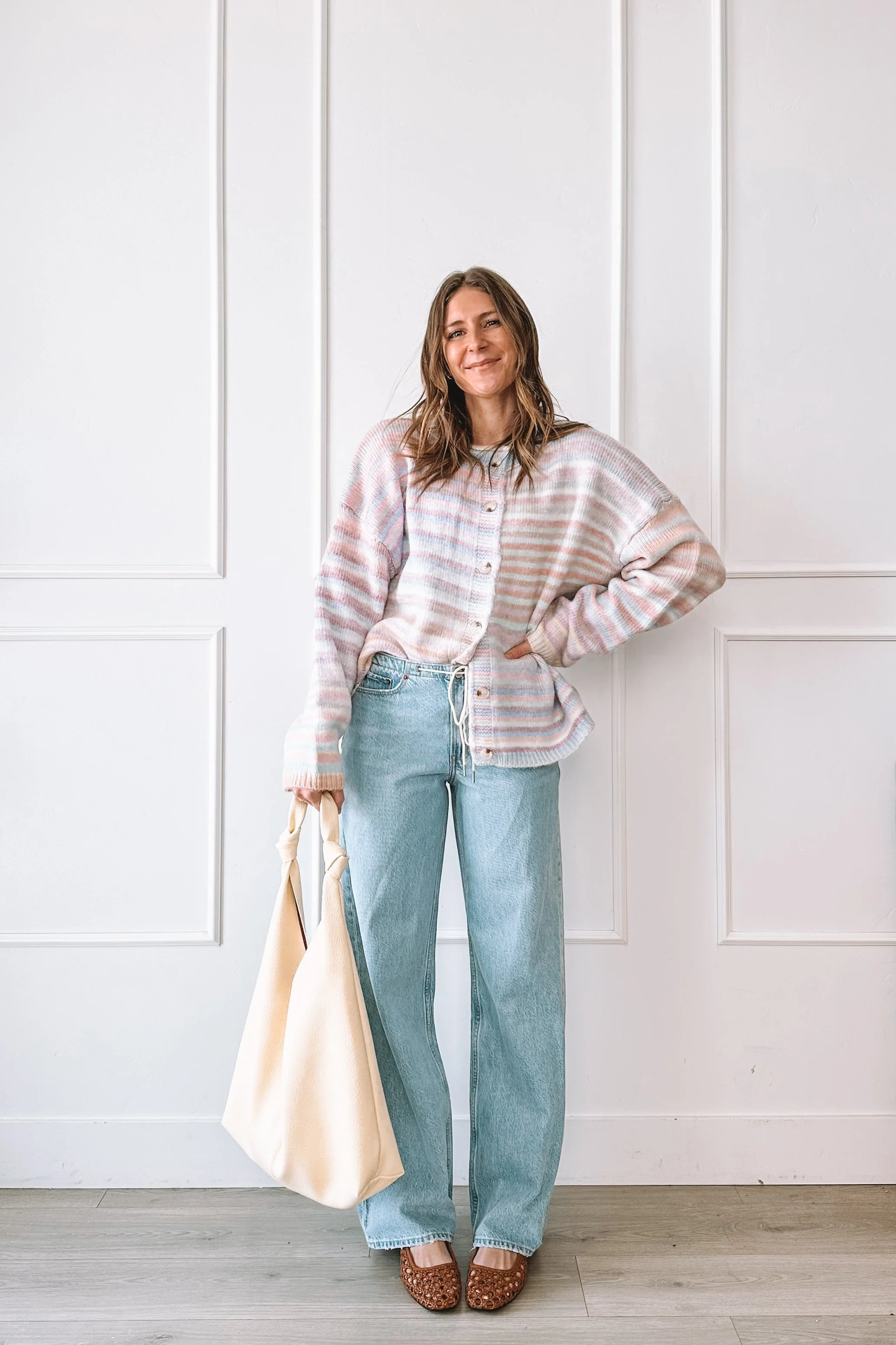 winter to spring everyday outfit with knit top and relaxed jeans