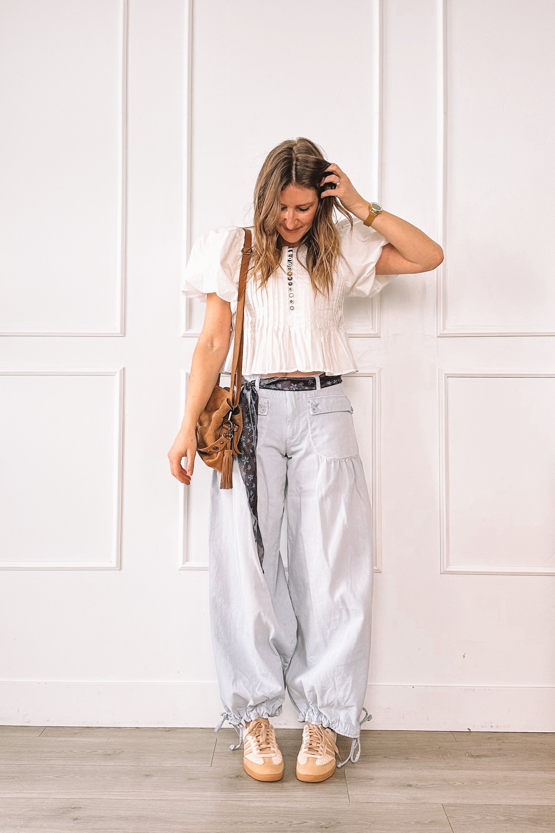 everyday outfit with free people pants and adidas crochet sneakers