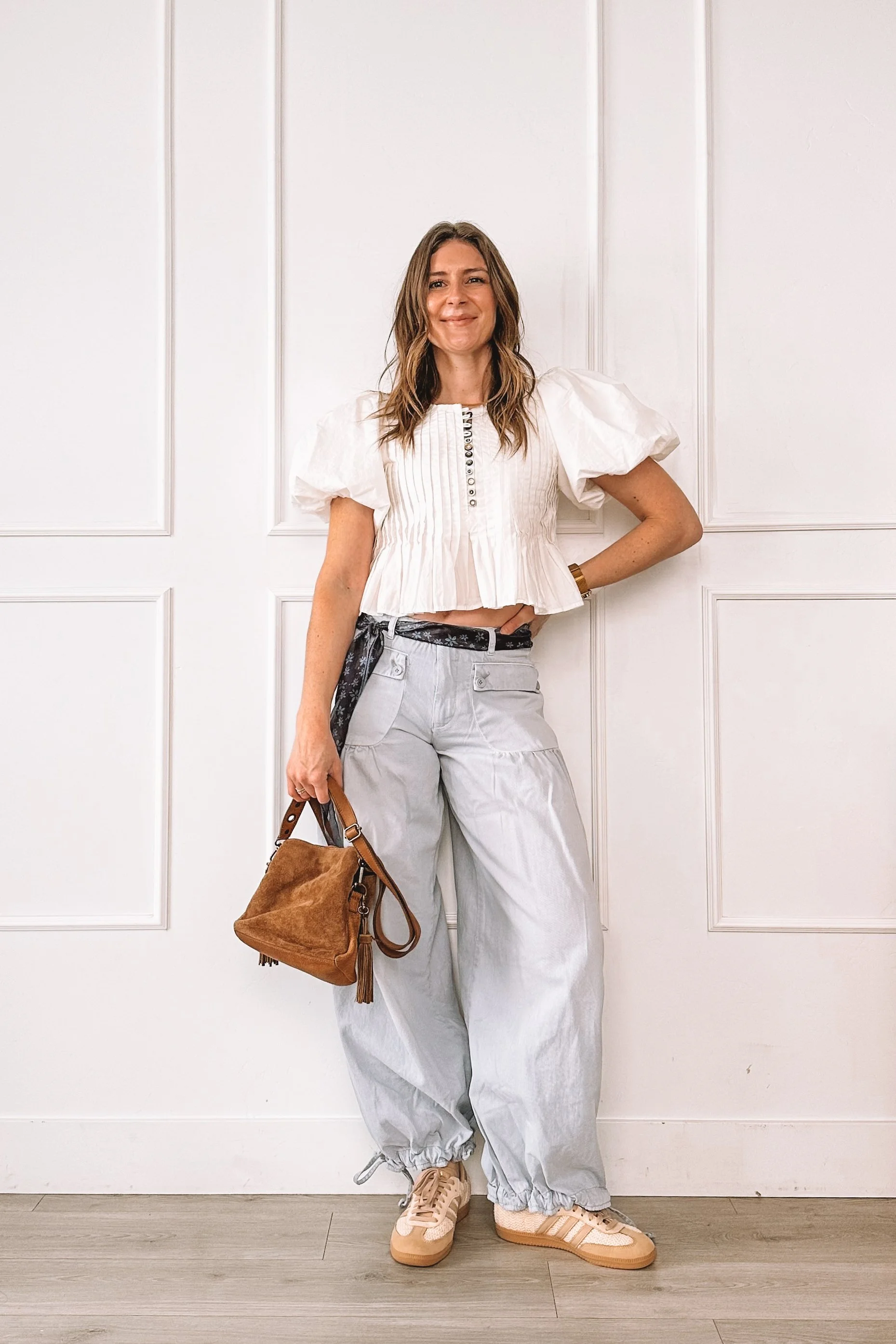 everyday outfit with free people pants and adidas crochet sneakers