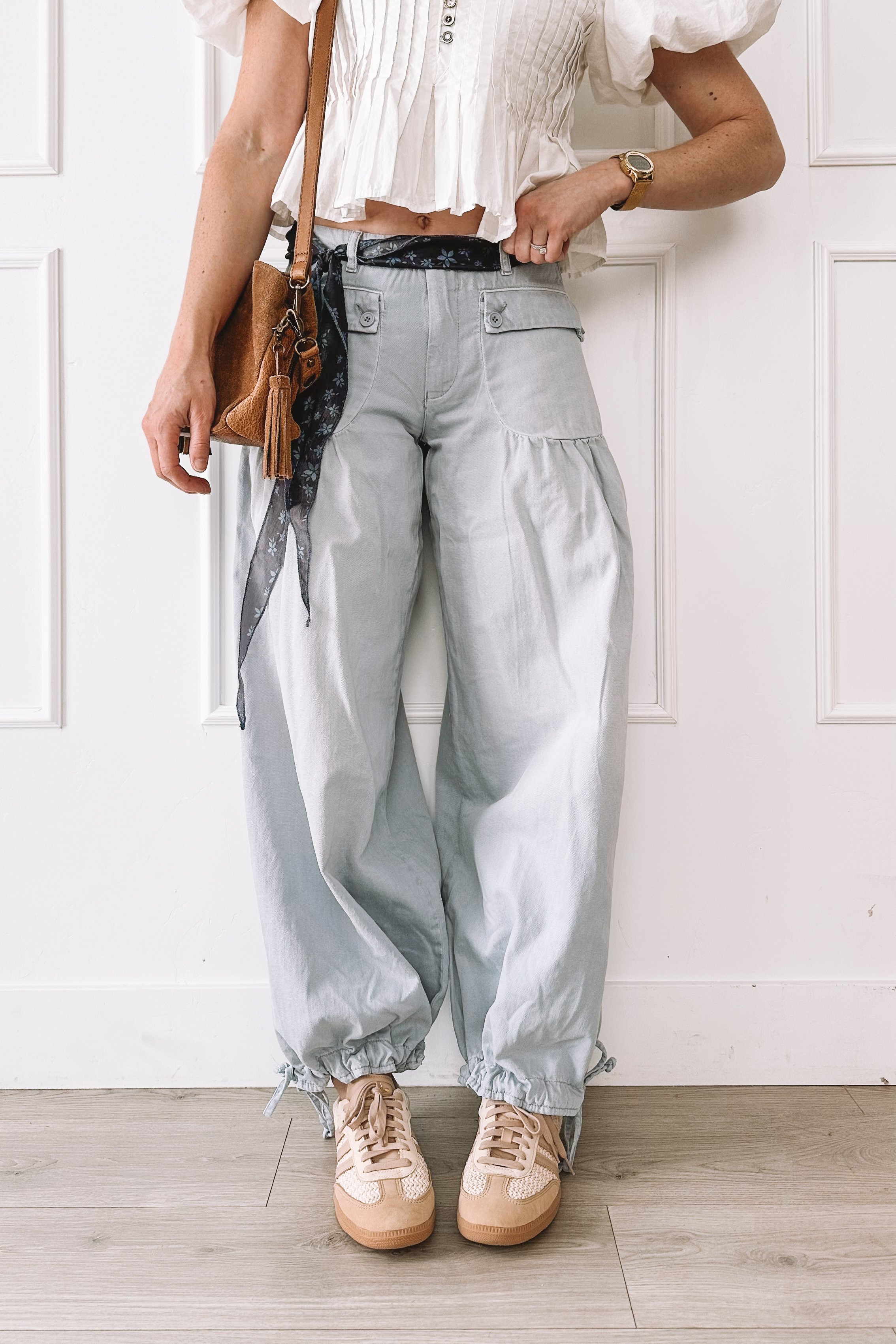 everyday outfit with free people pants and adidas crochet sneakers