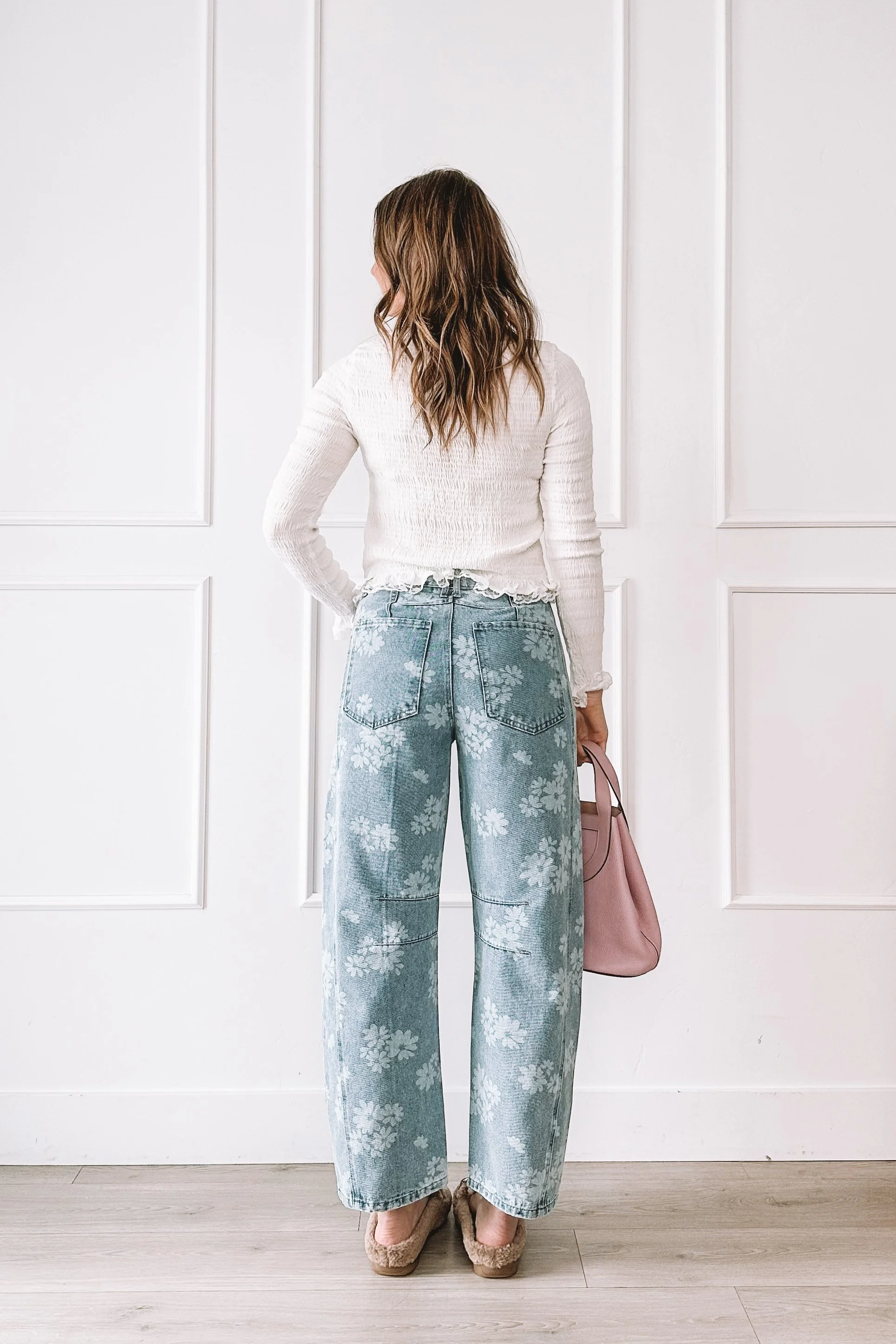 Floral jeans everyday outfit with cardigan and pink bag