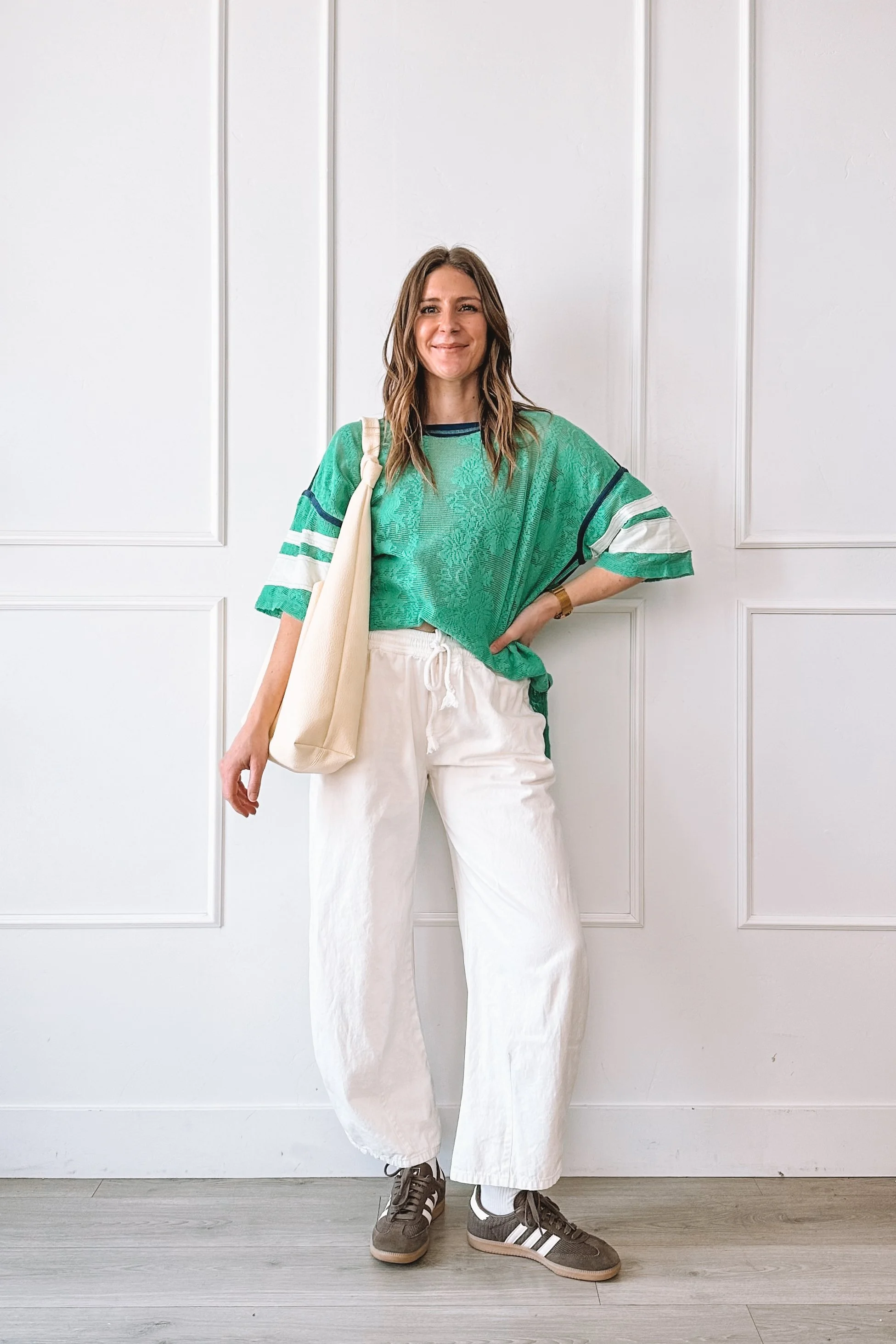 Spring Outfit With Green Top And Cream Pants