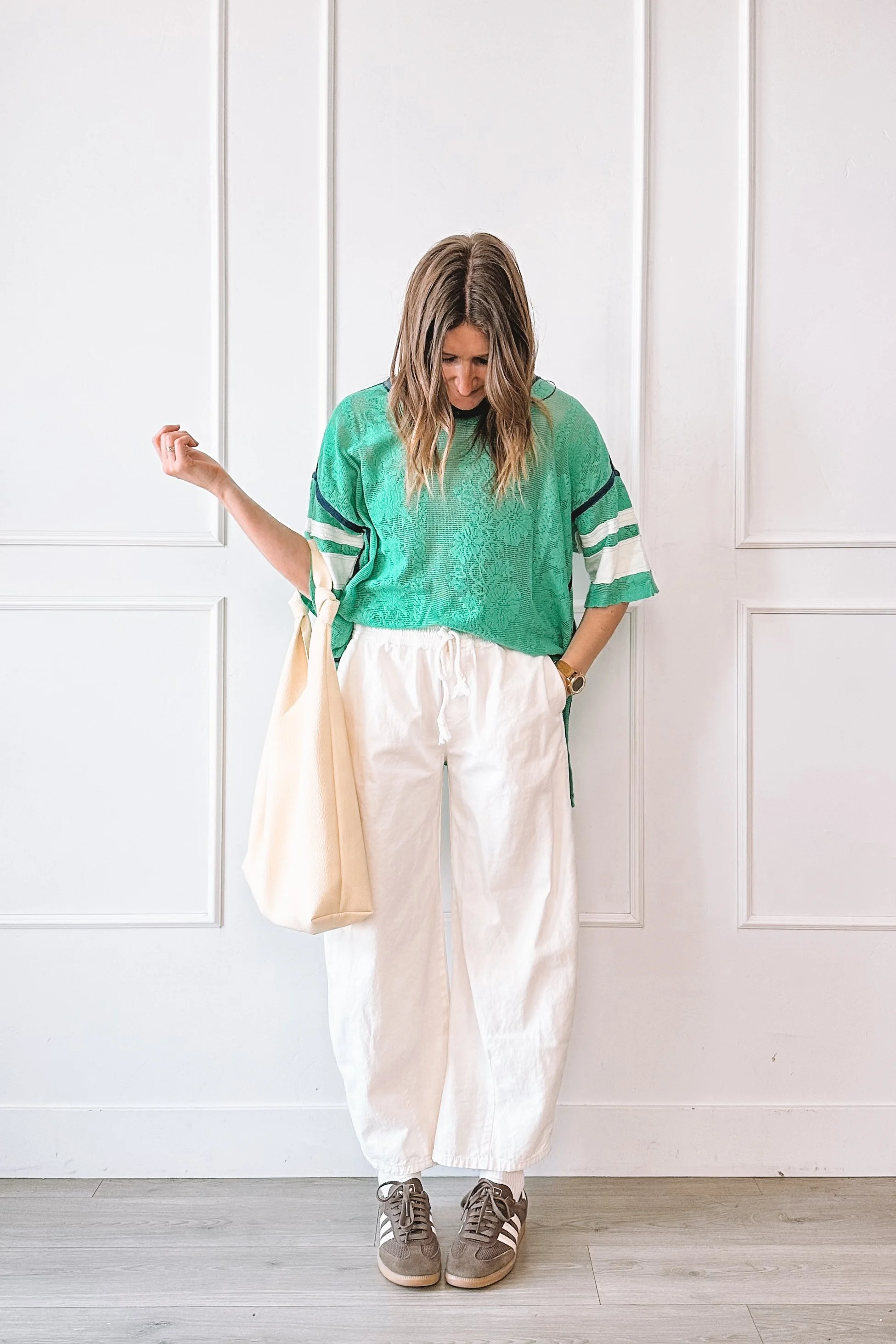 Spring Outfit With Green Top And Cream Pants