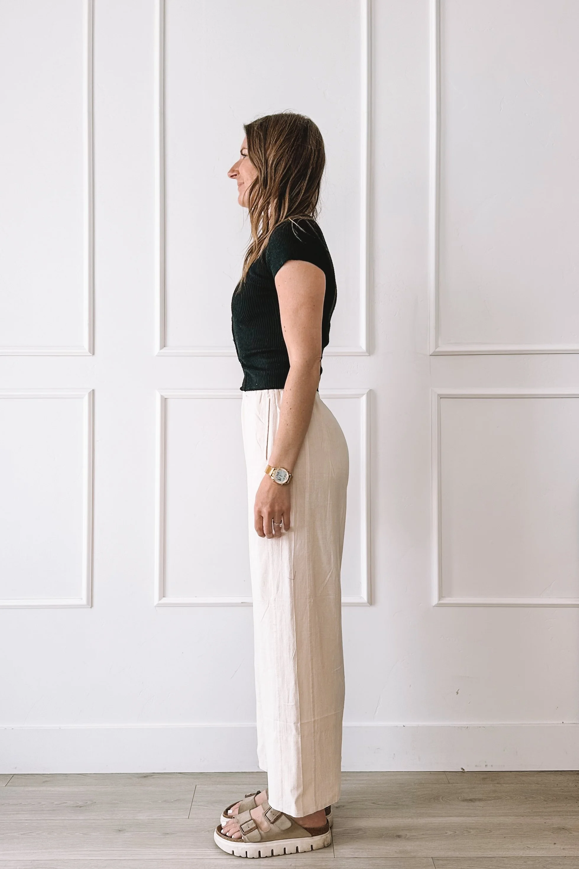 Black Top Cream Pants Casual Outfit