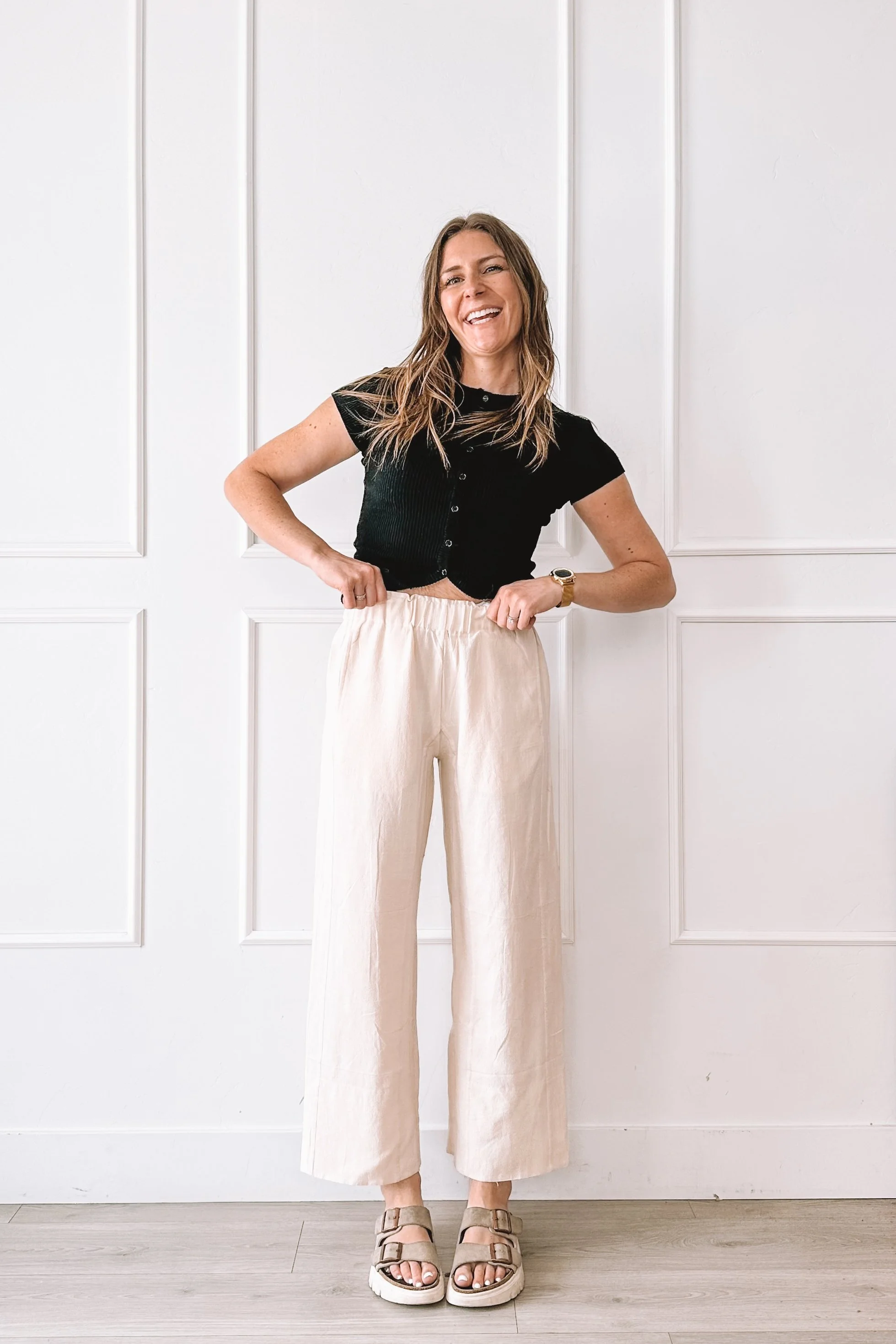 Black Top Cream Pants Casual Outfit