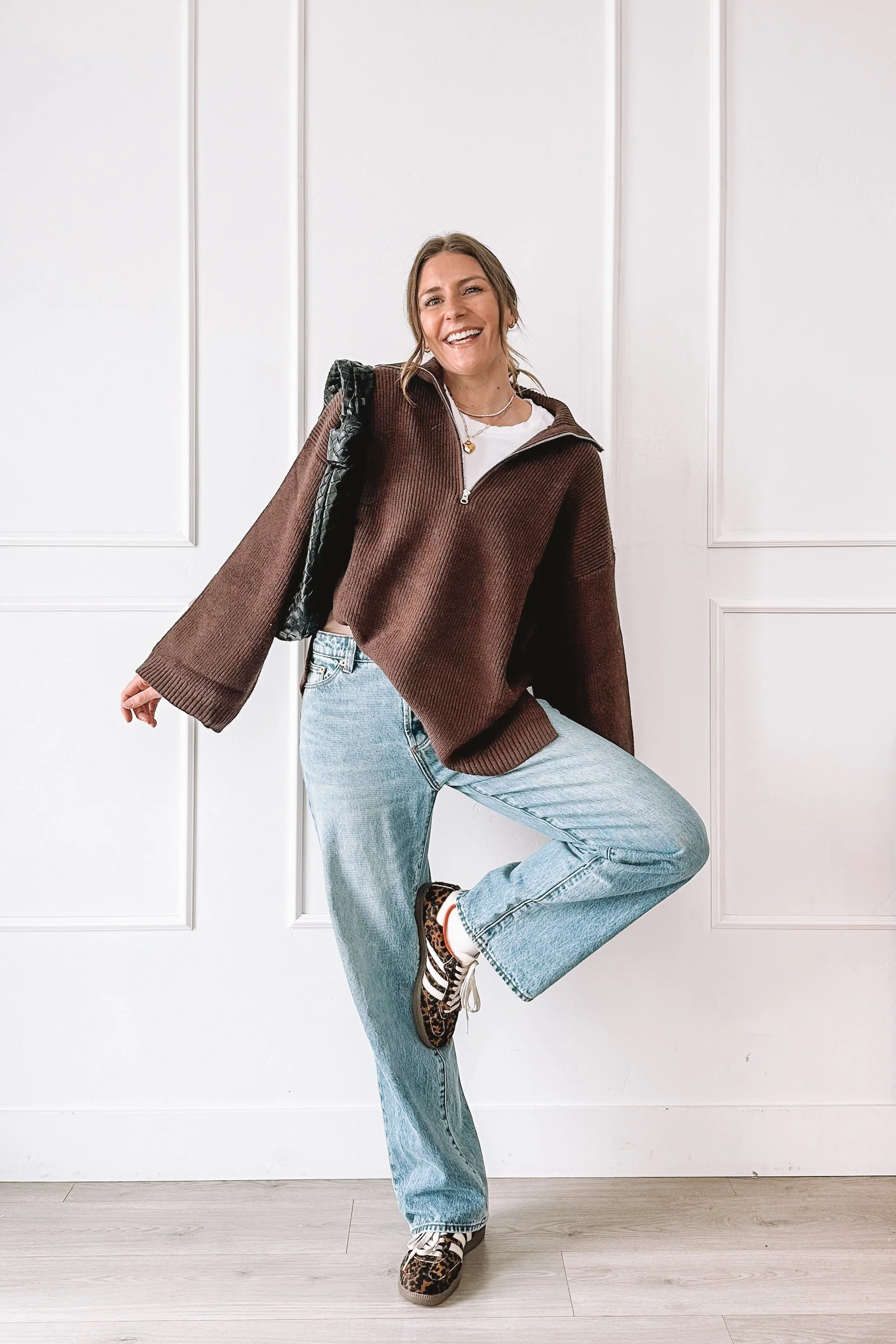 leopard-sneakers-outfit-wide-leg-jeans-brown-half-zip-sweater