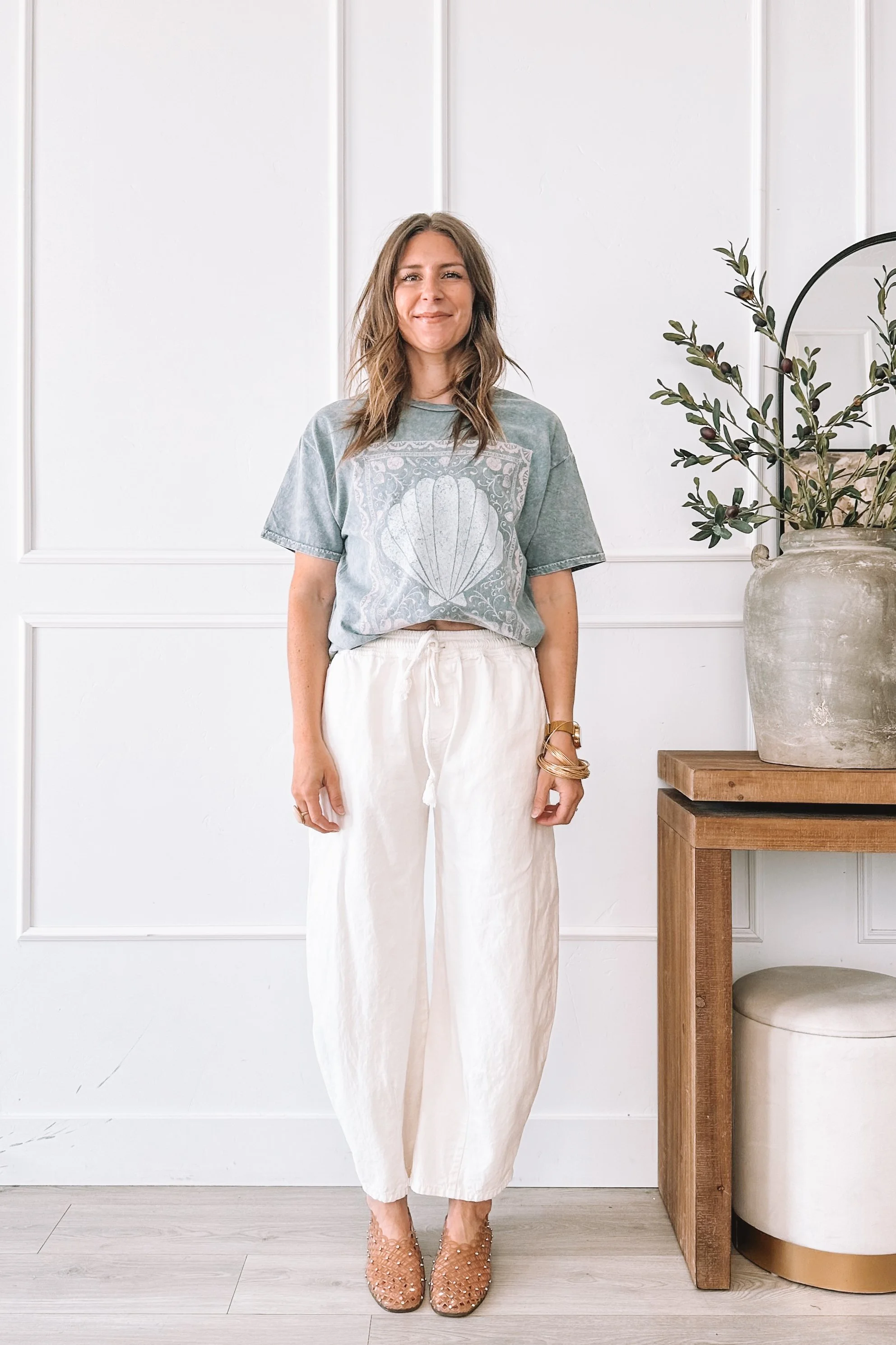 shell-graphic-tee-outfit-white-linen-pants-studded-mules