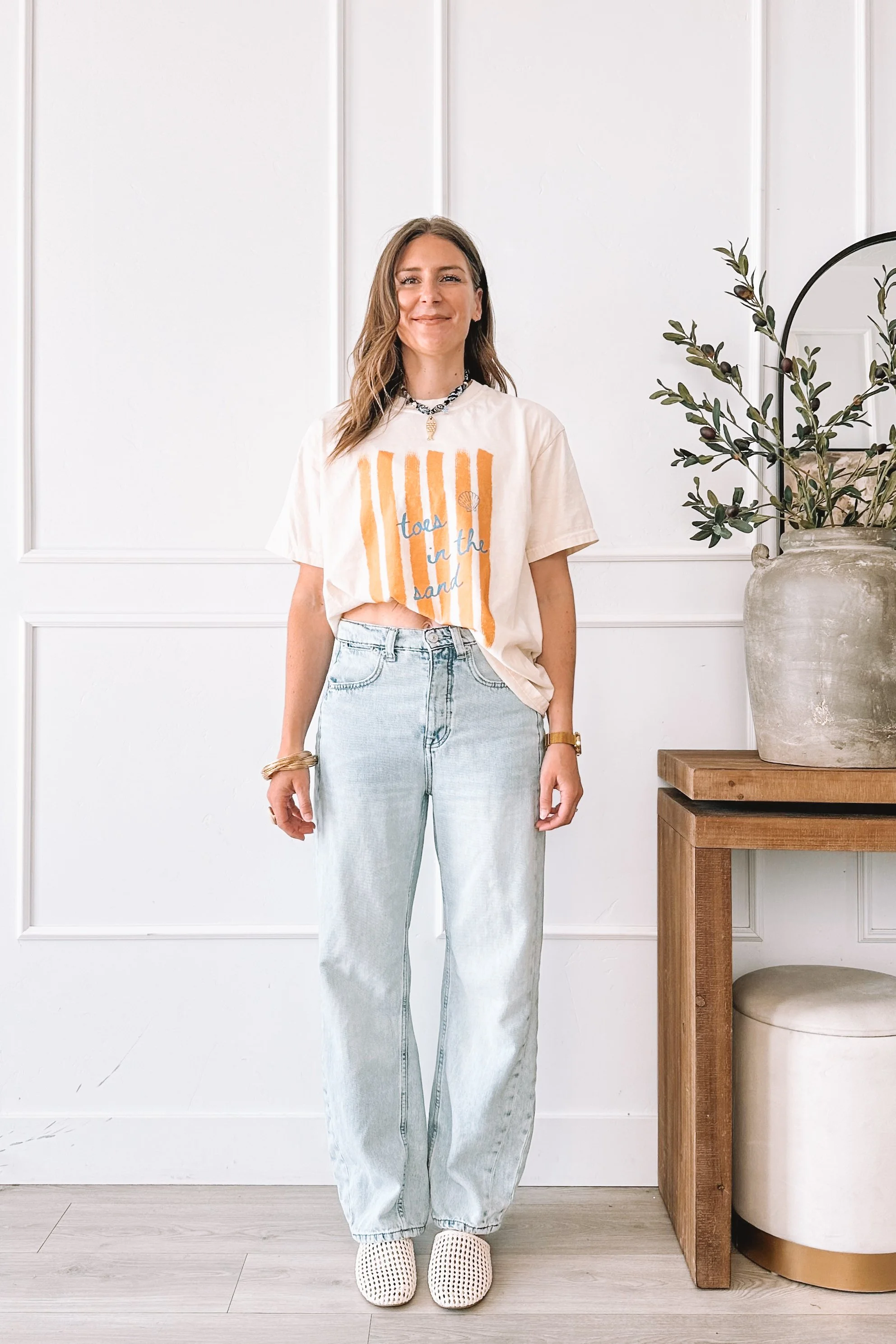 toes-in-the-sand-graphic-tee-outfit-wide-leg-jeans-woven-mules