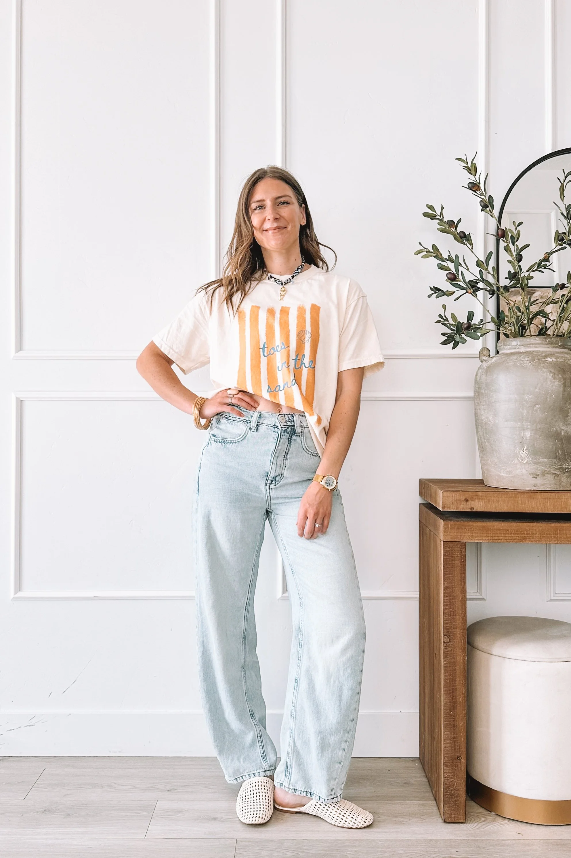 toes-in-the-sand-graphic-tee-outfit-wide-leg-jeans-woven-mules