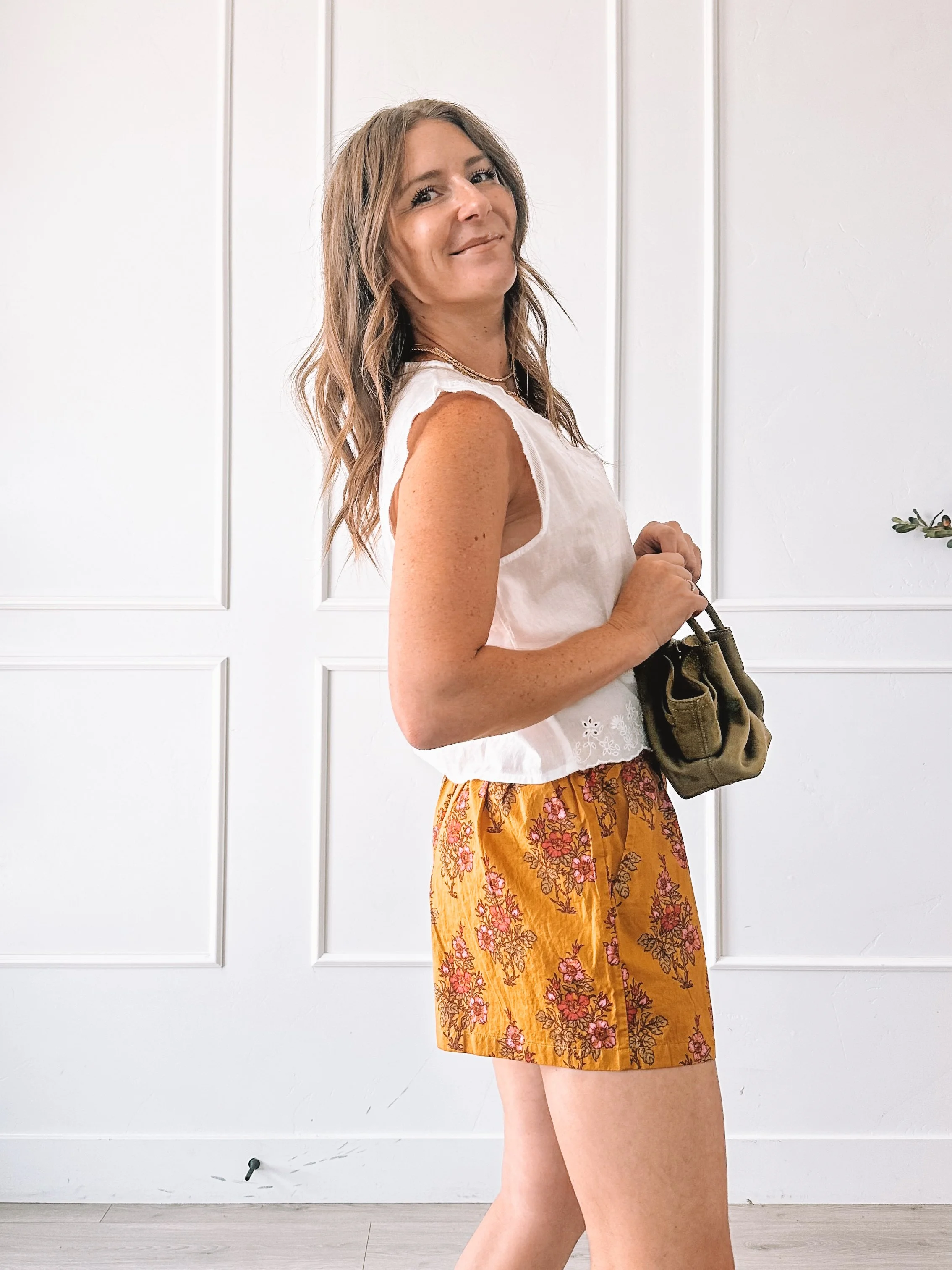 White Lace Top With Mustard Floral Shorts Outfit