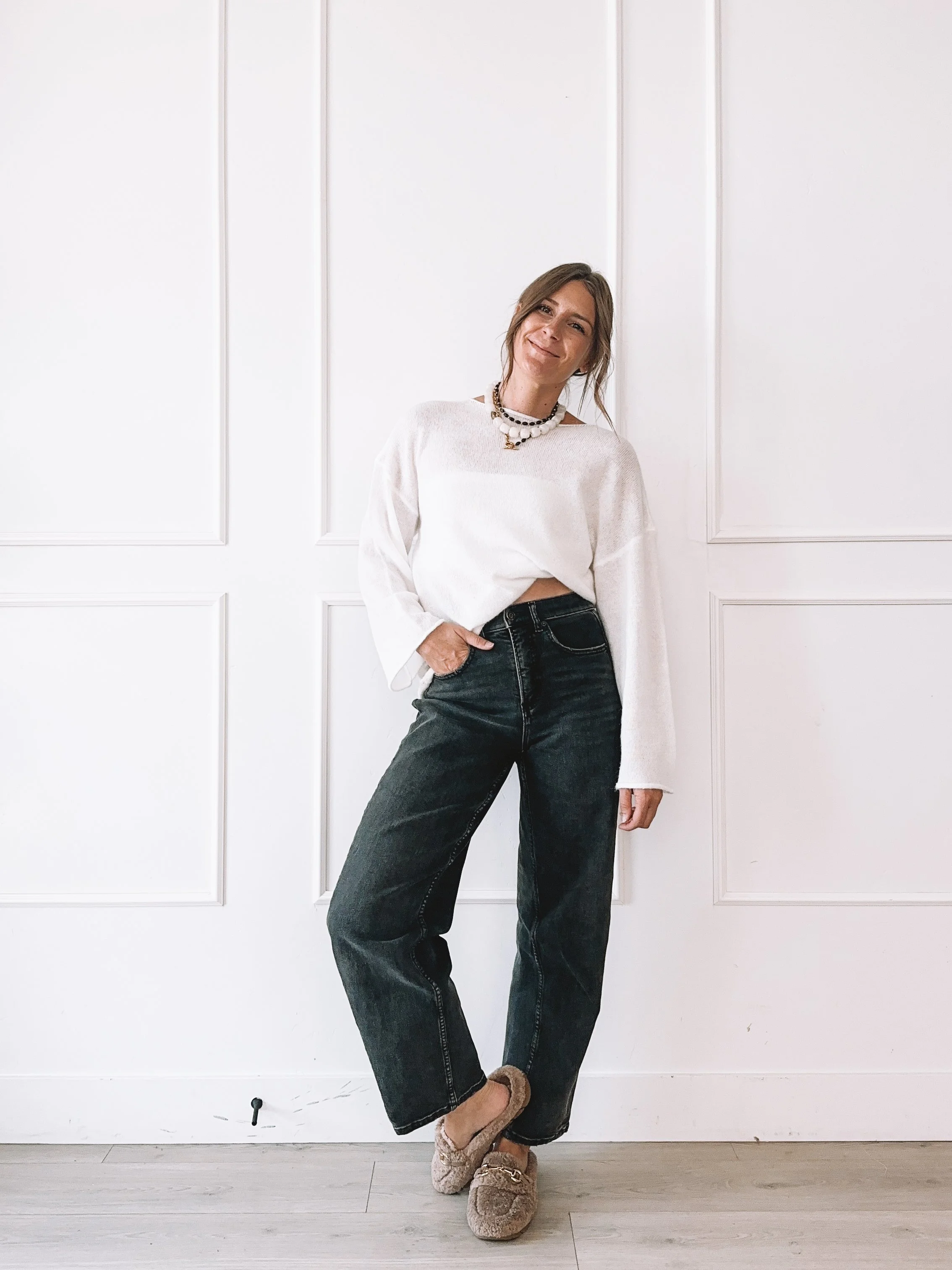 Cream sweater and wide leg jeans neutral fall outfit