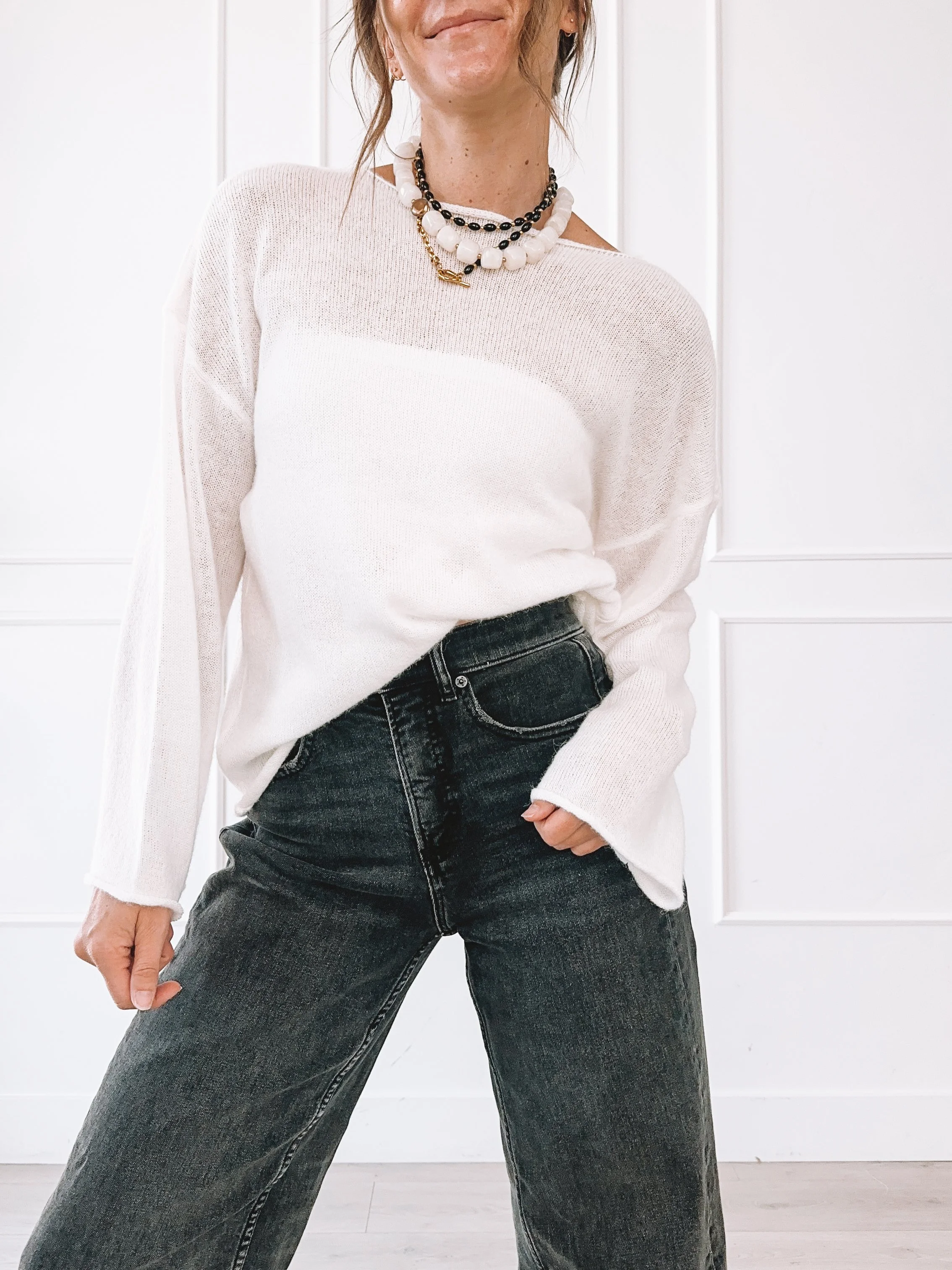 Cream sweater and wide leg jeans neutral fall outfit