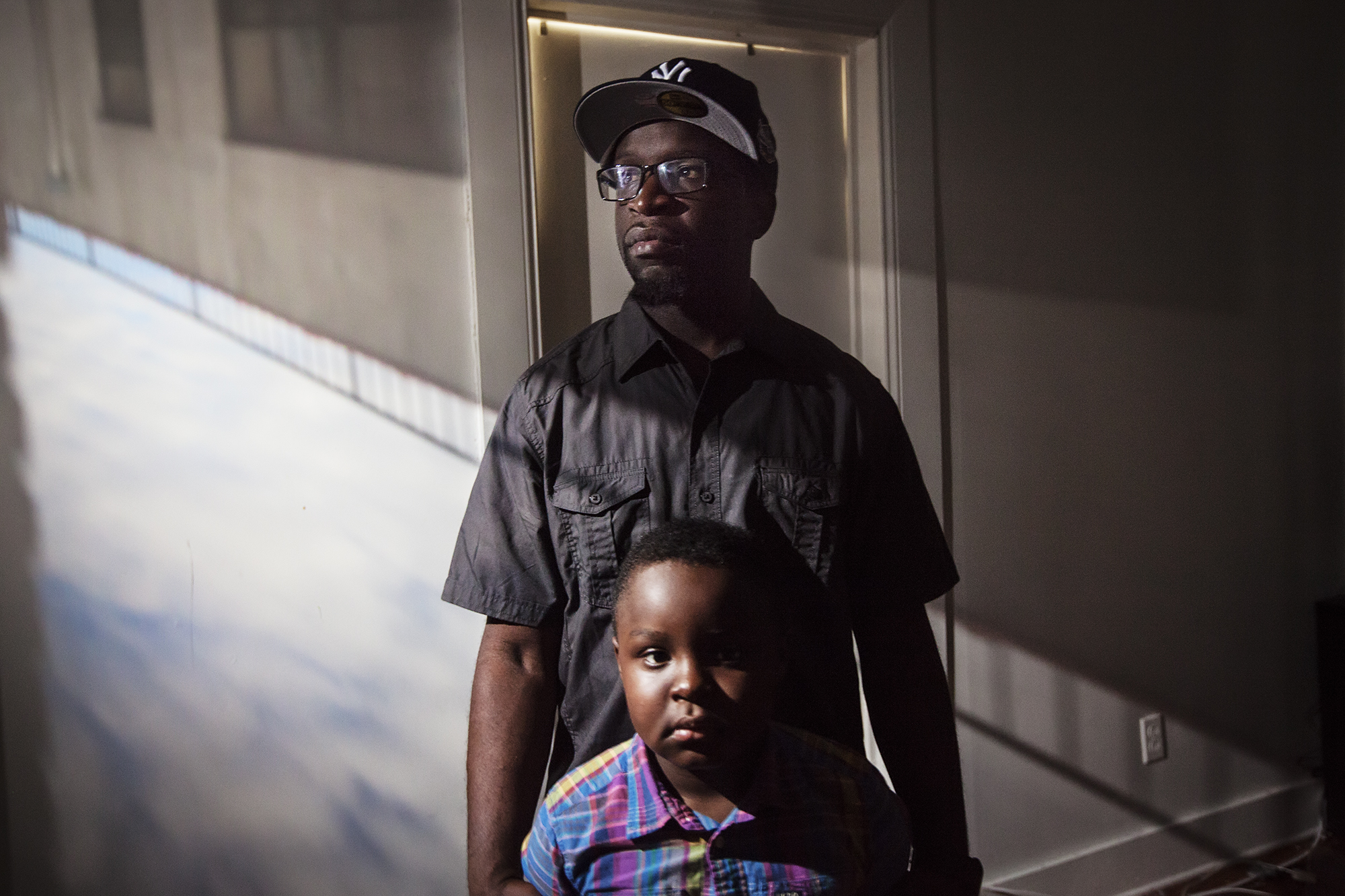 Clifton Jerrick, 35, poses for a portrait with his son, Logan Suttor, in East New York, NY on March 12, 2016. “Being a father is just not a title, it’s a job. It’s a full time job until the day you die.”