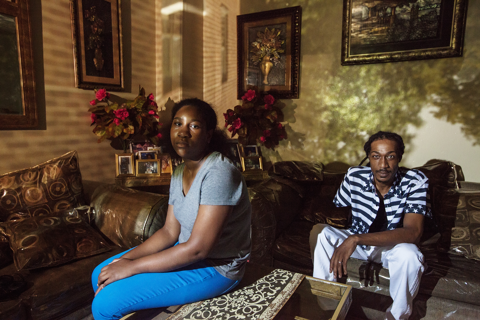 Jason "Law" Woods, 42, poses for a portrait with his daughter, Nevoeh West-Woods, in East New York, NY on July 28, 2015. "The courts do work for men but a lot of men won't pursue that. 'Cause it's been throughout time that you go to court for your child and nine times out of ten, they gonna give it back to the woman. It's like: why fight?"