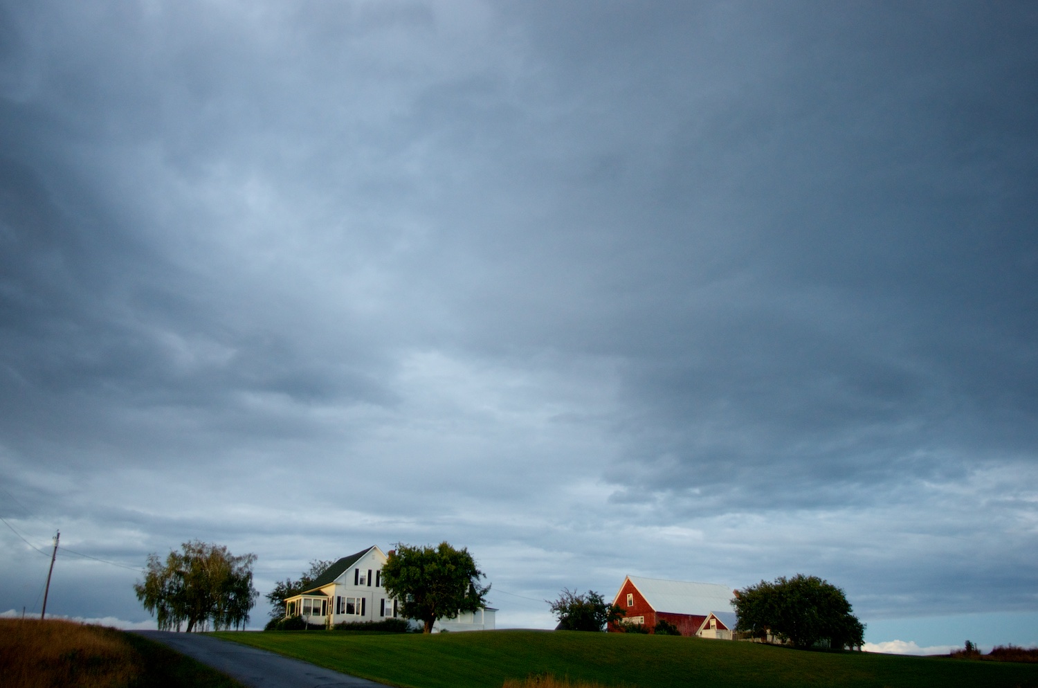 Farmhouse On A Hill