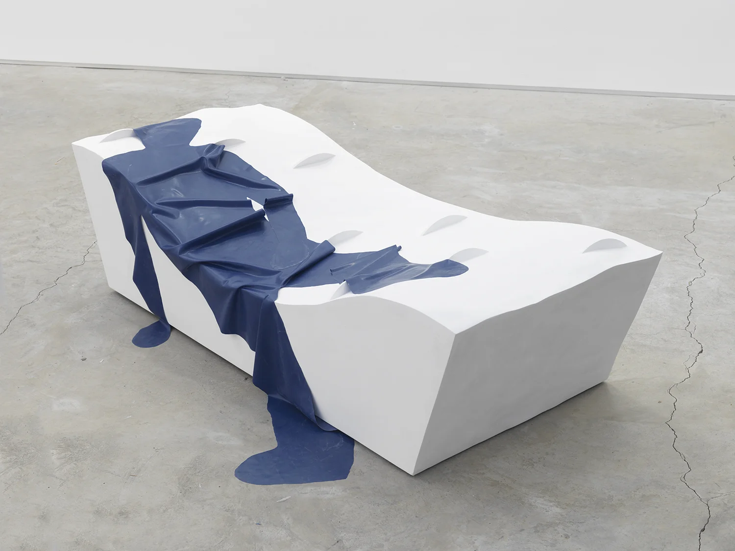 32H – EXISTENCE Passing through, being marked and to some extent damaged by the geography of the present. 2016, plaster, foam, wood and latex, 21 x 73 x 30 inches